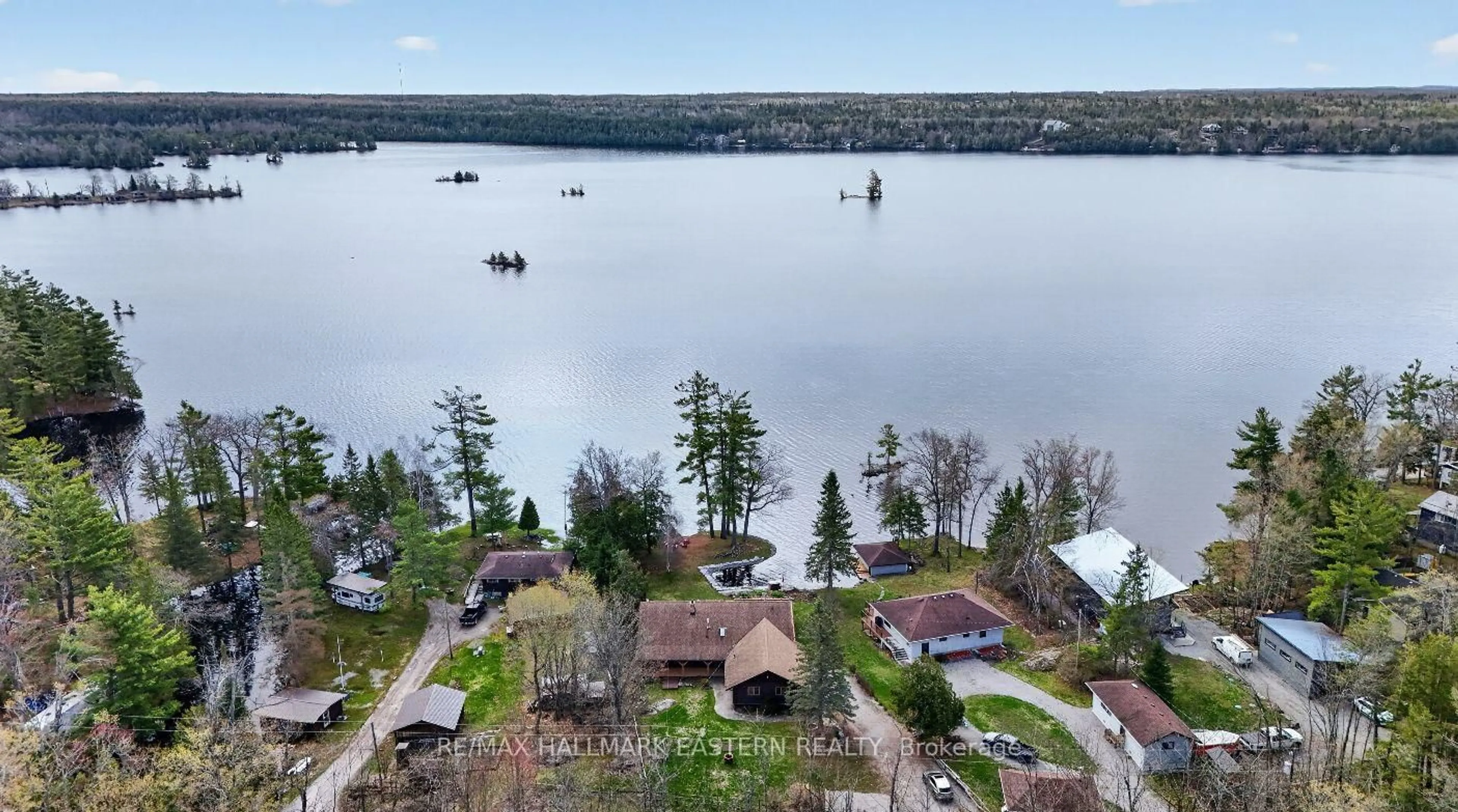 A pic from outside/outdoor area/front of a property/back of a property/a pic from drone, water/lake/river/ocean view for 206 Fire Route 96, Trent Lakes Ontario K0M 1A0