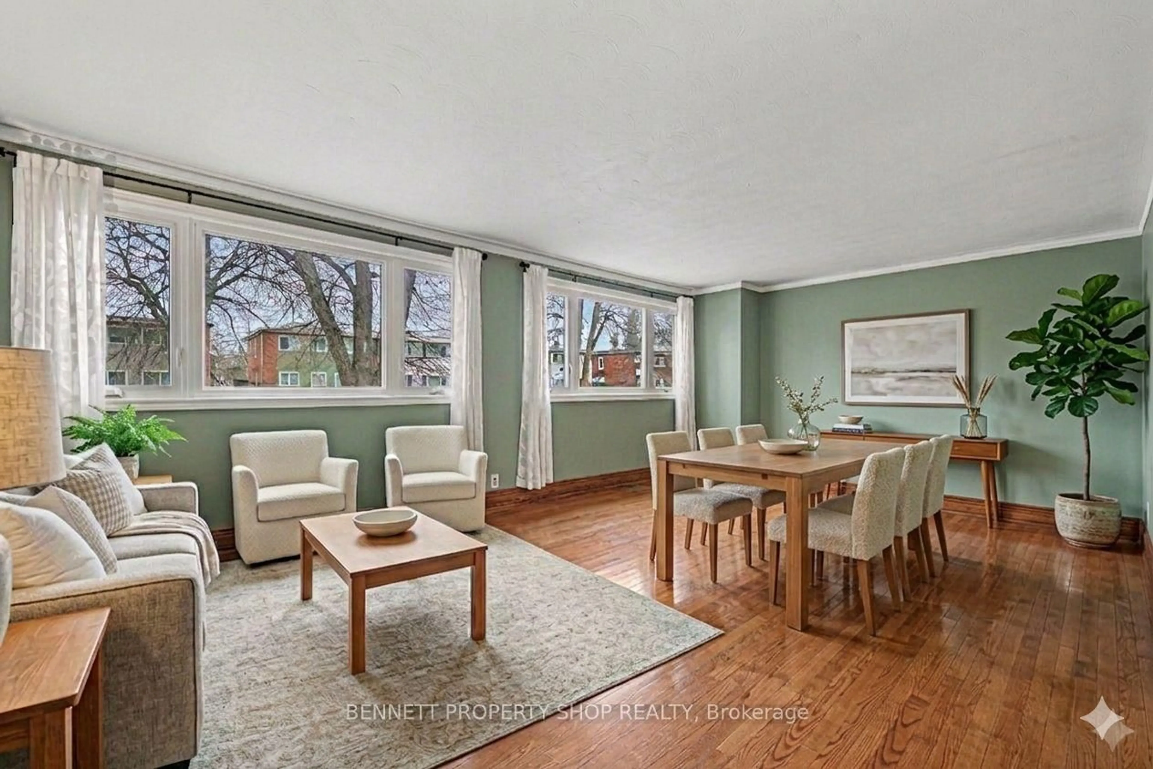 Living room with furniture, wood/laminate floor for 673 Morin St, Ottawa Ontario K1K 3G8