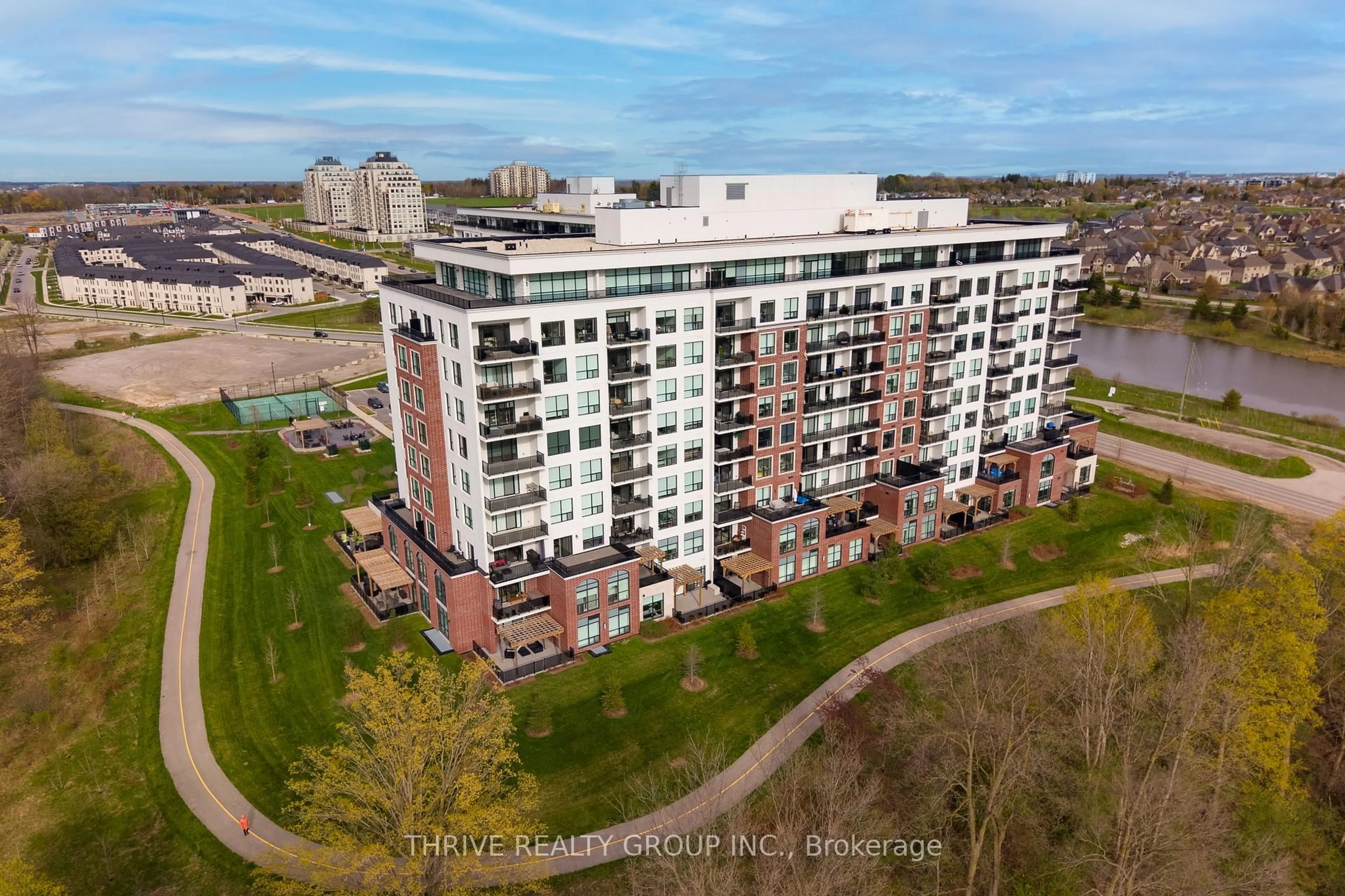 A pic from outside/outdoor area/front of a property/back of a property/a pic from drone, unknown for 460 Callaway Rd #104, London North Ontario N6G 0N8