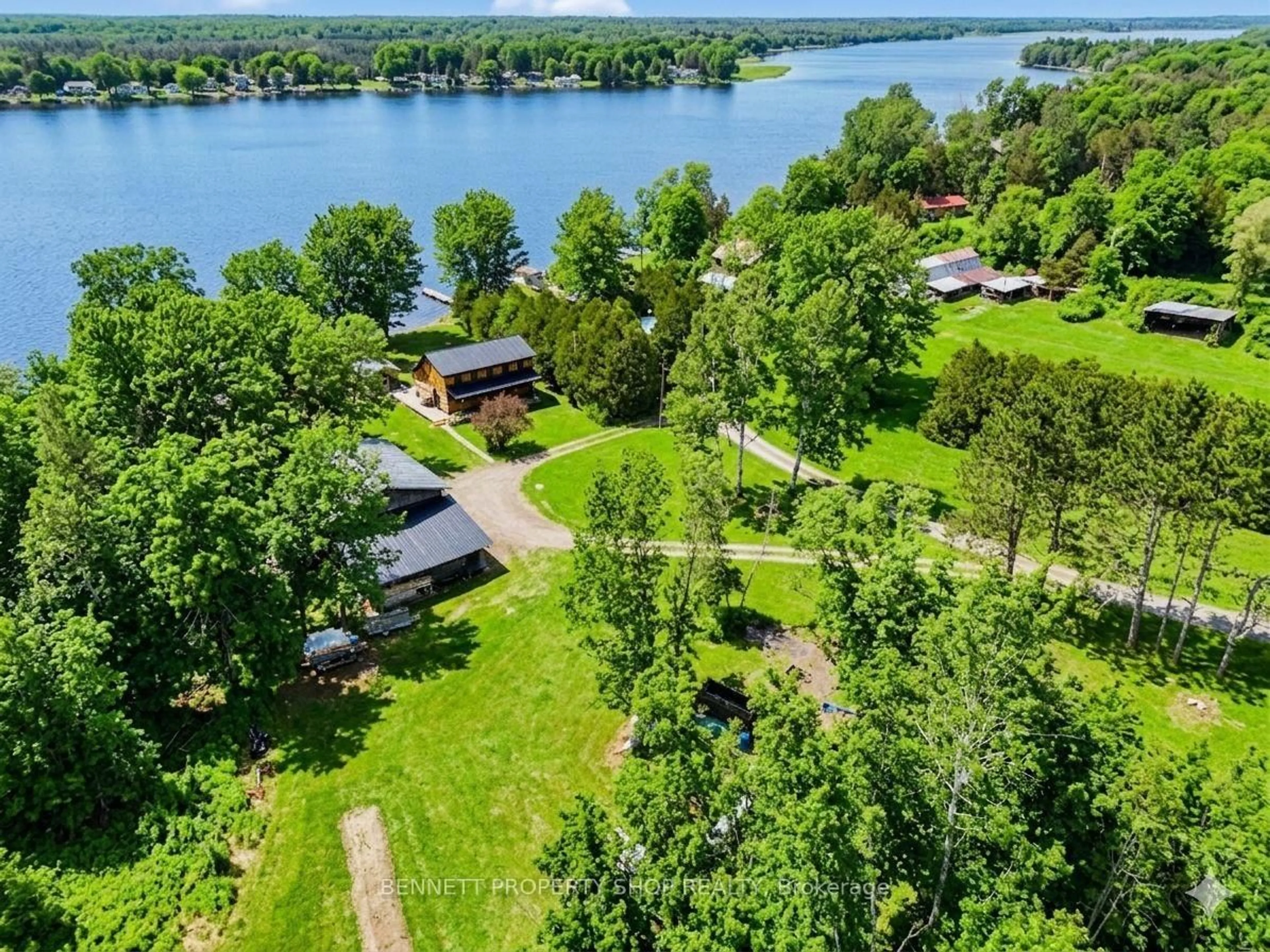 A pic from outside/outdoor area/front of a property/back of a property/a pic from drone, water/lake/river/ocean view for 60 Corktown Lane, Merrickville-Wolford Ontario K0G 1N0
