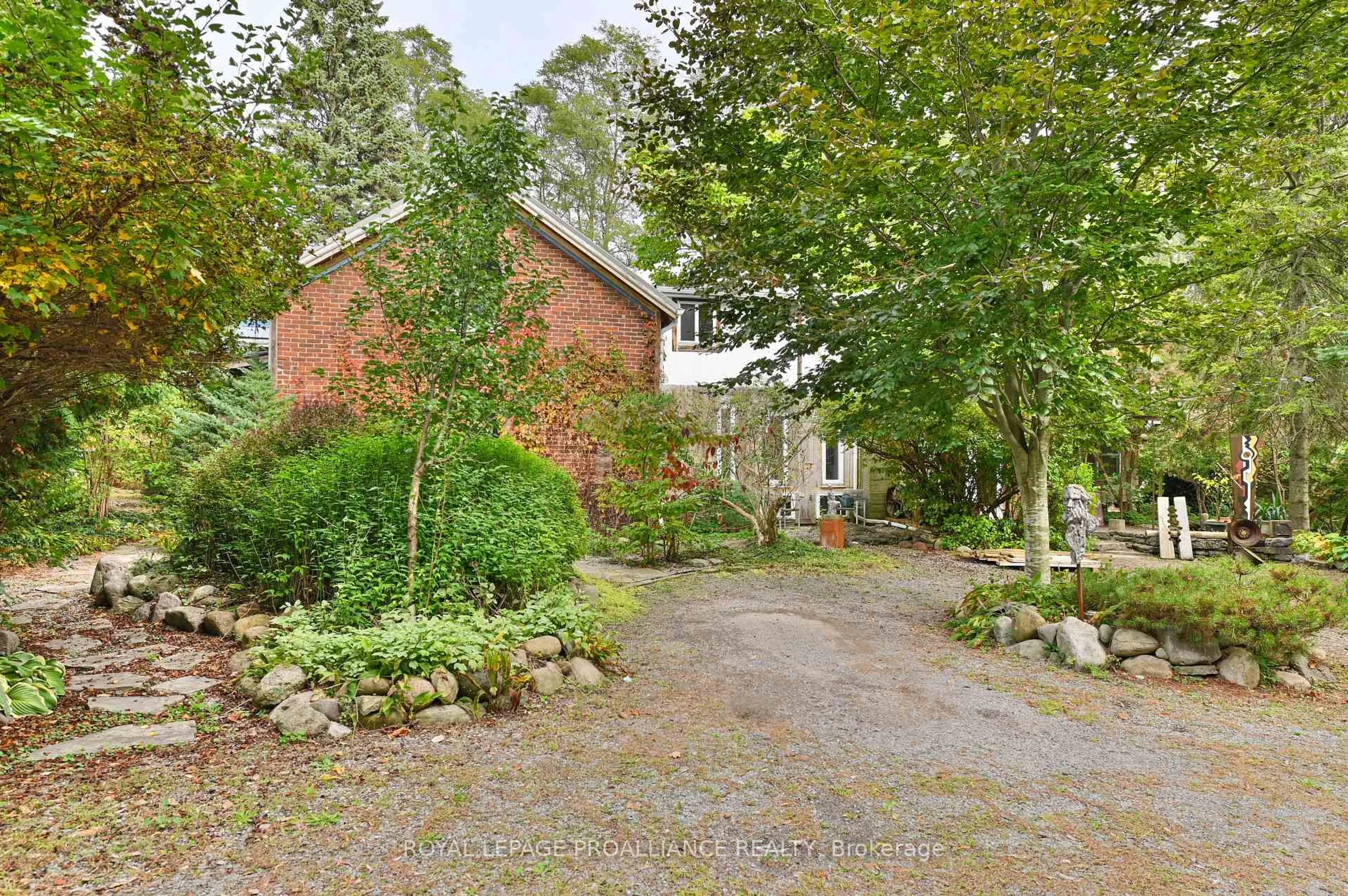 A pic from outside/outdoor area/front of a property/back of a property/a pic from drone, street for 15047 County Road 2 Rd, Brighton Ontario K0K 1H0