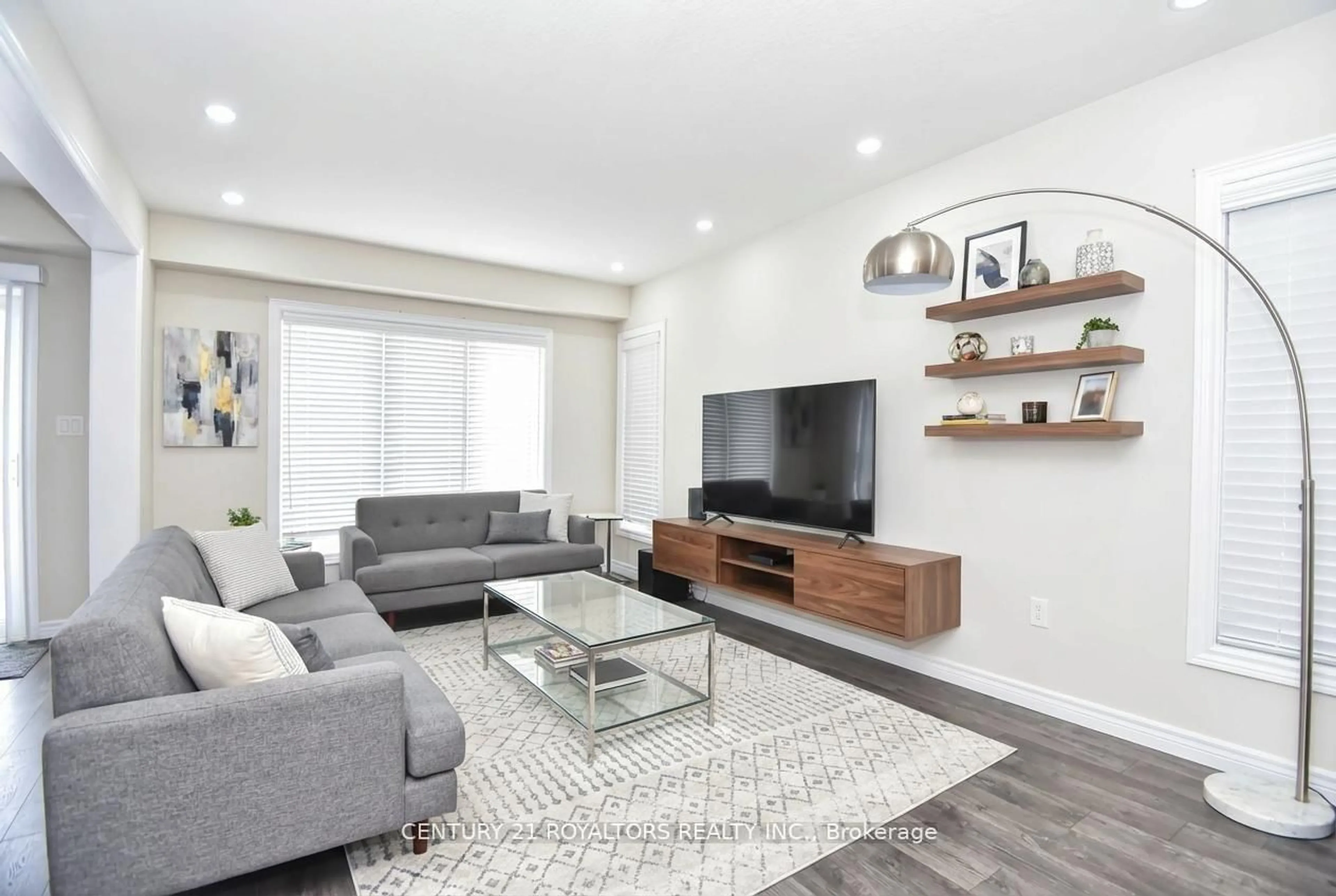 Living room with furniture, wood/laminate floor for 1584 Dunkirk Ave, Woodstock Ontario N4T 0L1