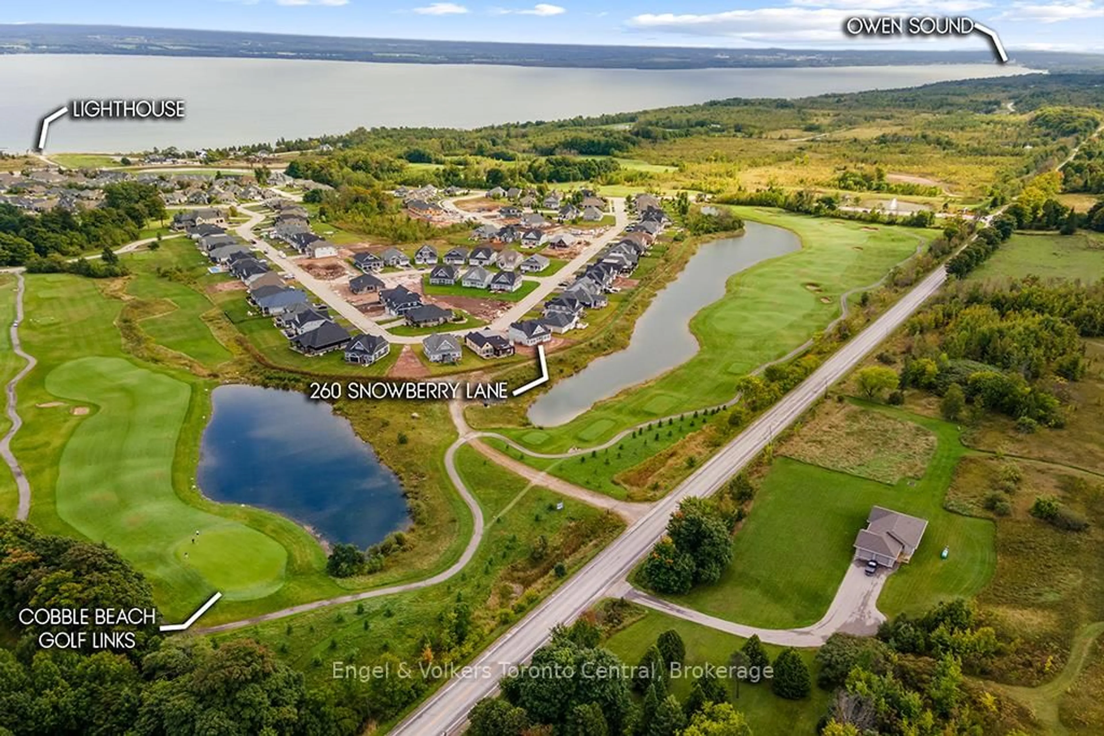 A pic from outside/outdoor area/front of a property/back of a property/a pic from drone, water/lake/river/ocean view for 260 Snowberry Lane, Georgian Bluffs Ontario N0H 1S0