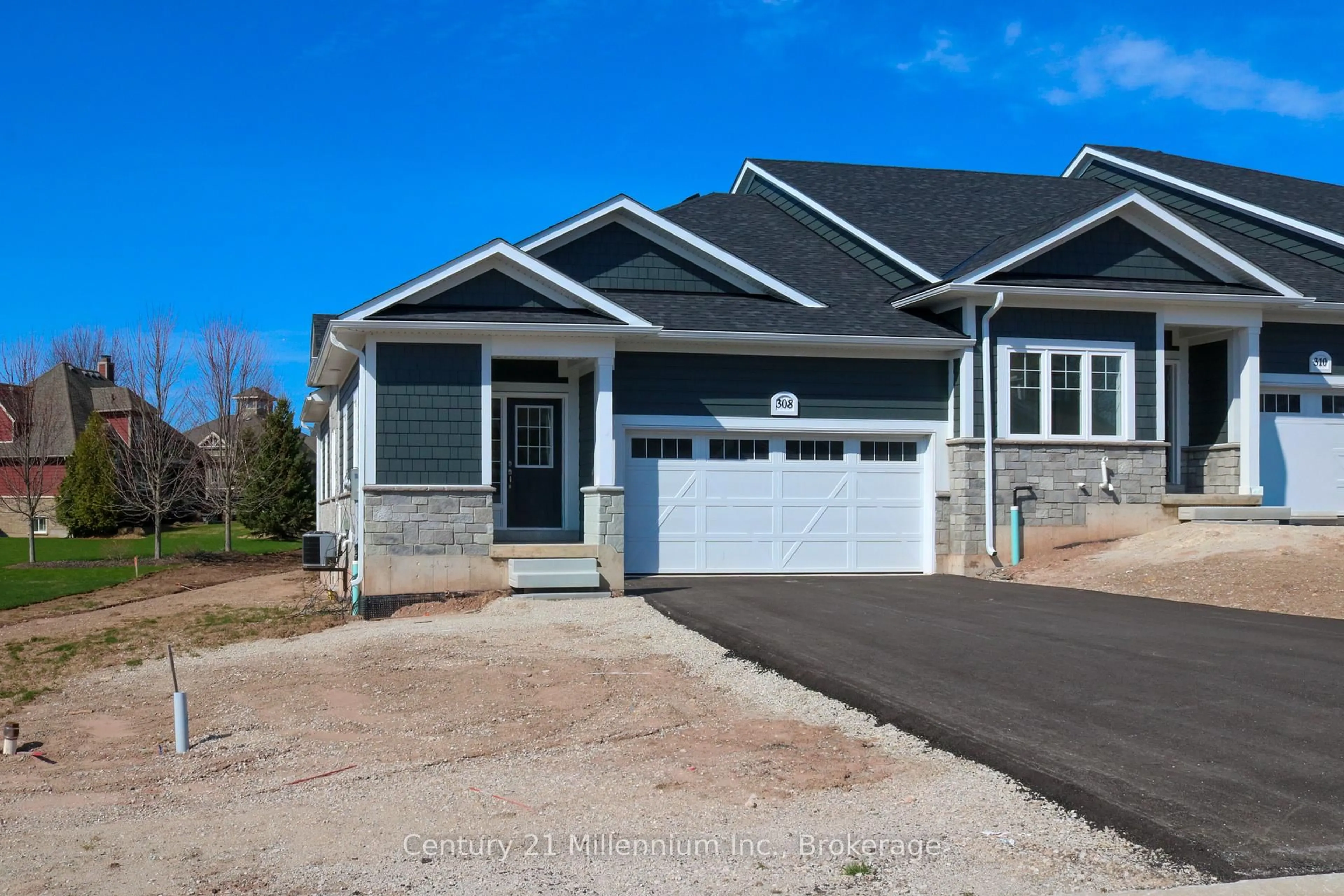 Home with vinyl exterior material, street for 308 Telford Tr, Georgian Bluffs Ontario N0H 1S0