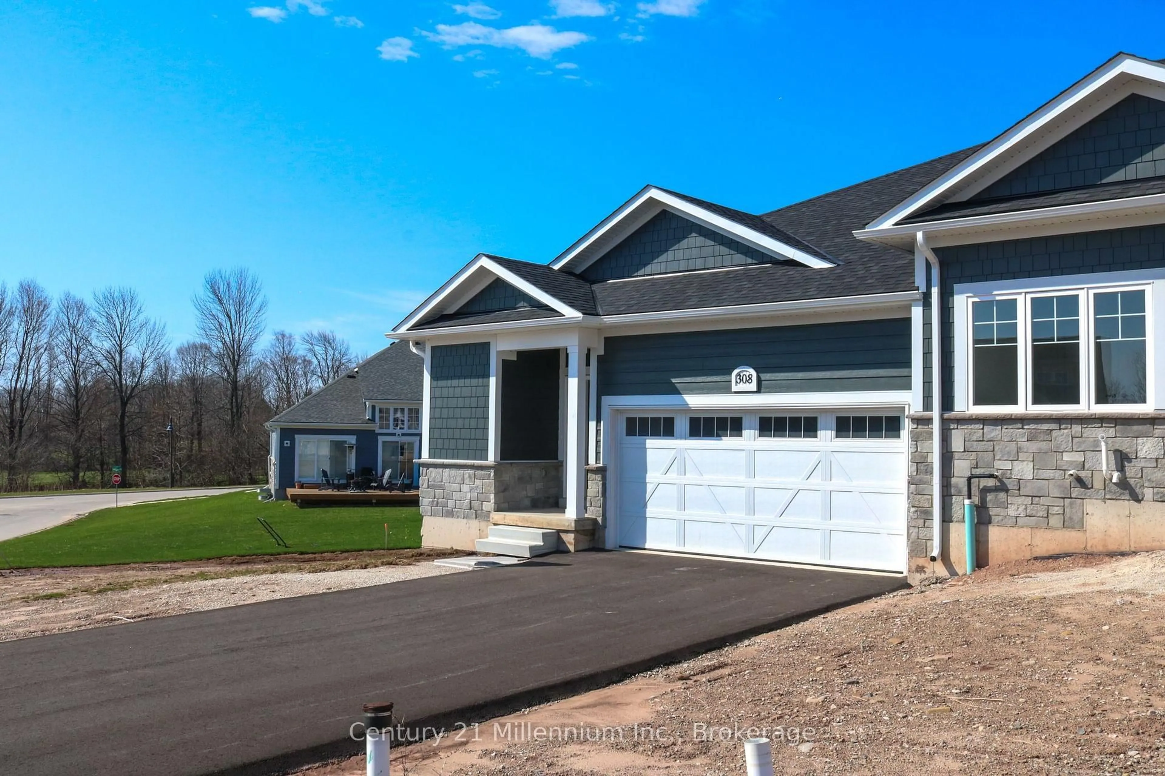 Home with vinyl exterior material, street for 308 Telford Tr, Georgian Bluffs Ontario N0H 1S0