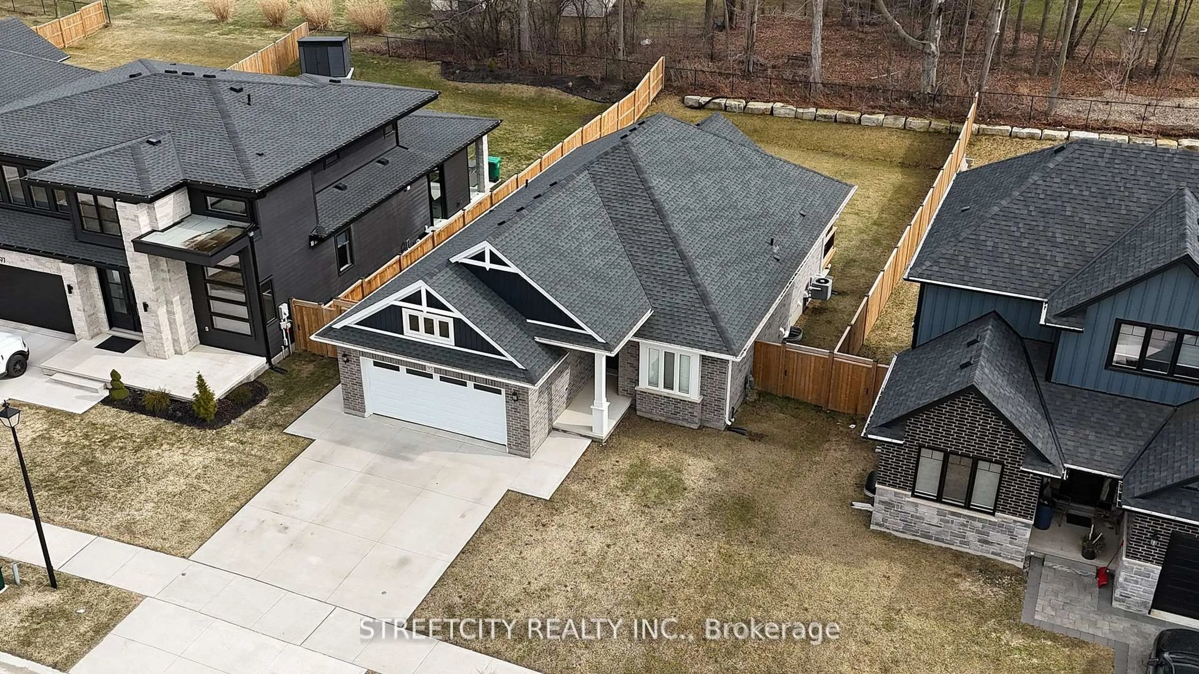 A pic from outside/outdoor area/front of a property/back of a property/a pic from drone, street for 95 Optimist Dr, Southwold Ontario N5P 3T2