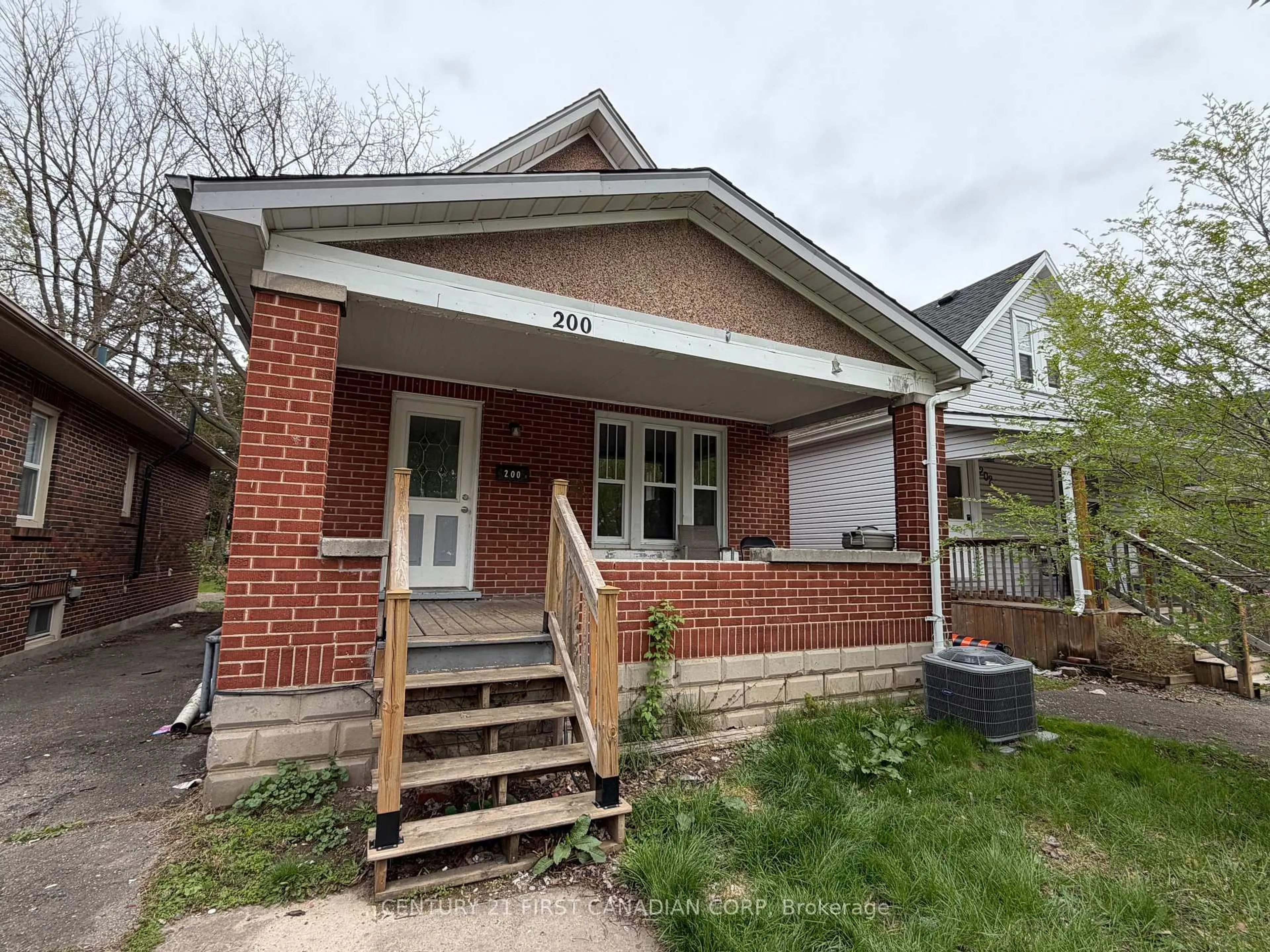 Home with brick exterior material, street for 200 Huron St, London East Ontario N6A 2J5