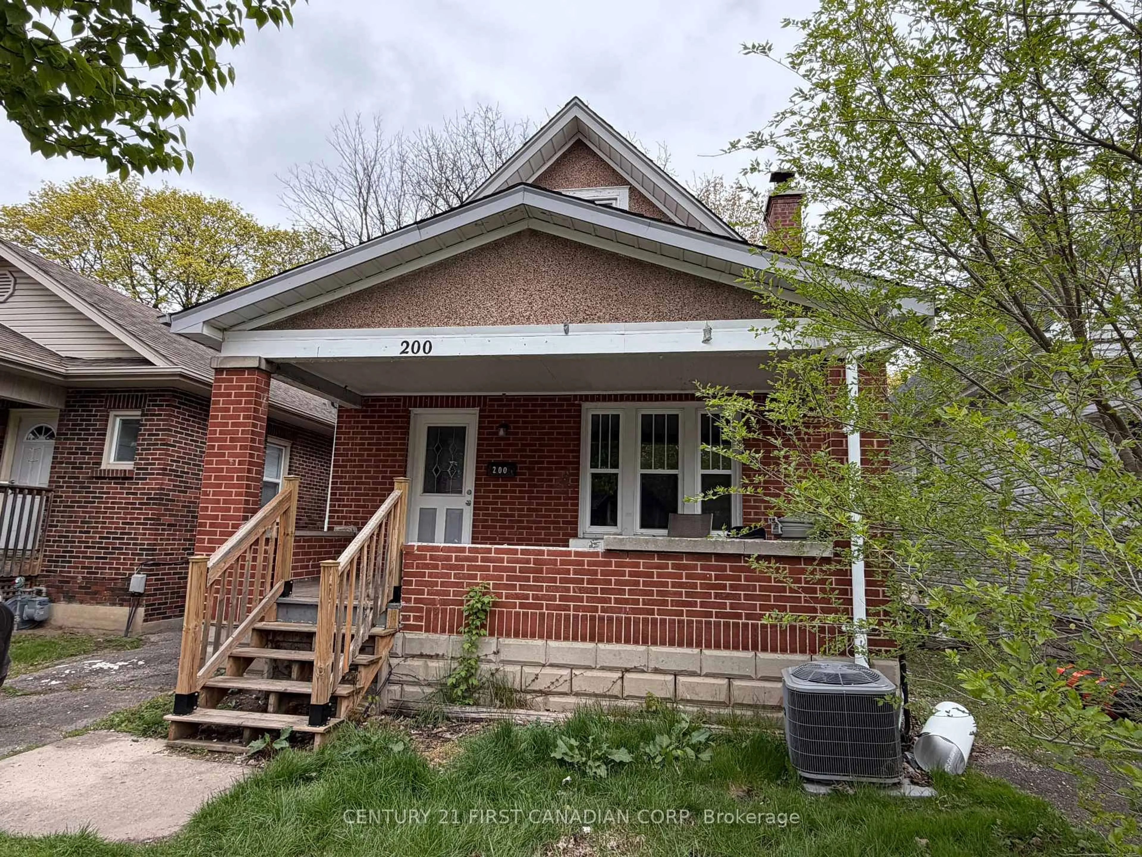 Home with brick exterior material, street for 200 Huron St, London East Ontario N6A 2J5