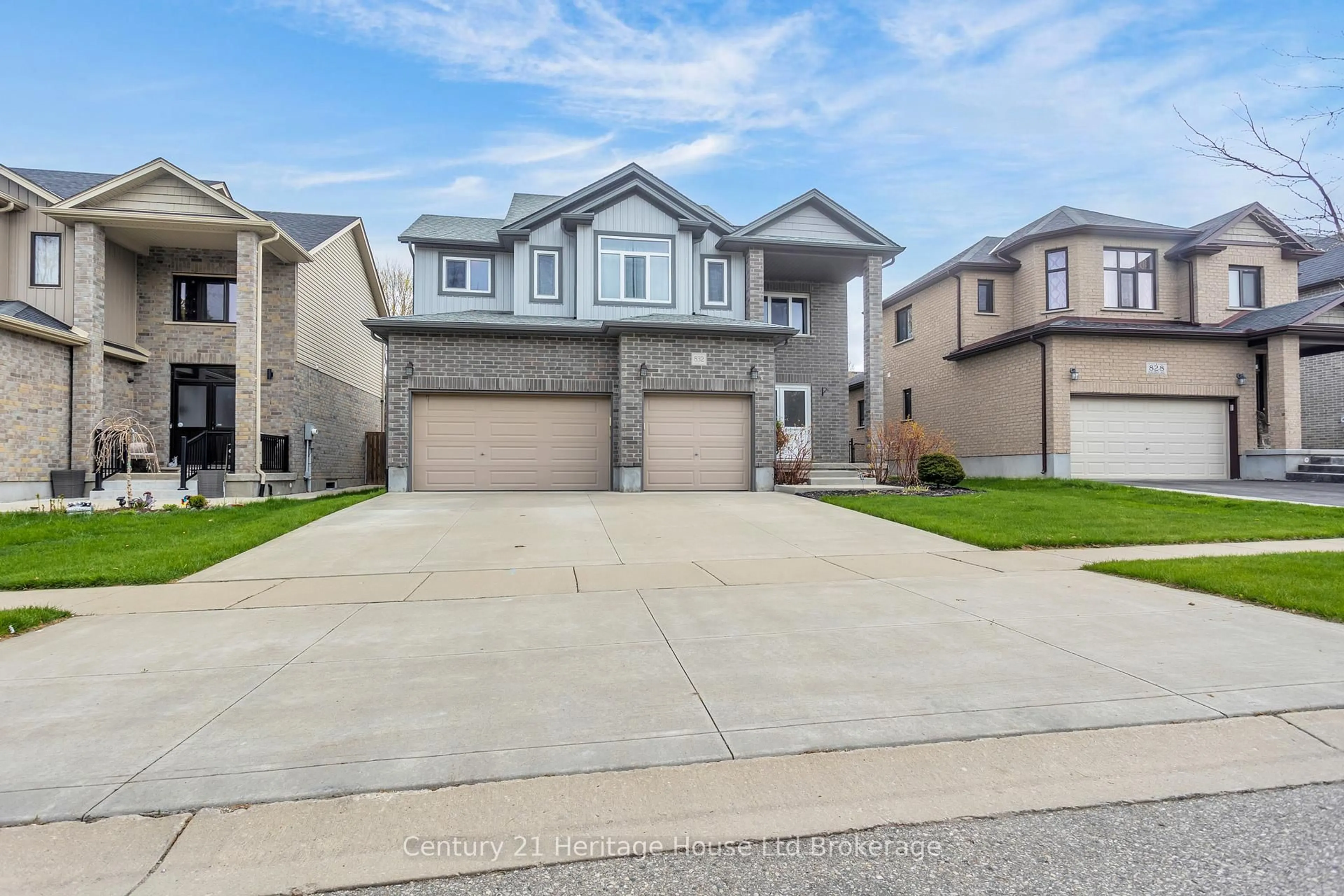 Home with vinyl exterior material, street for 832 Halifax Rd, Woodstock Ontario N4T 0C6