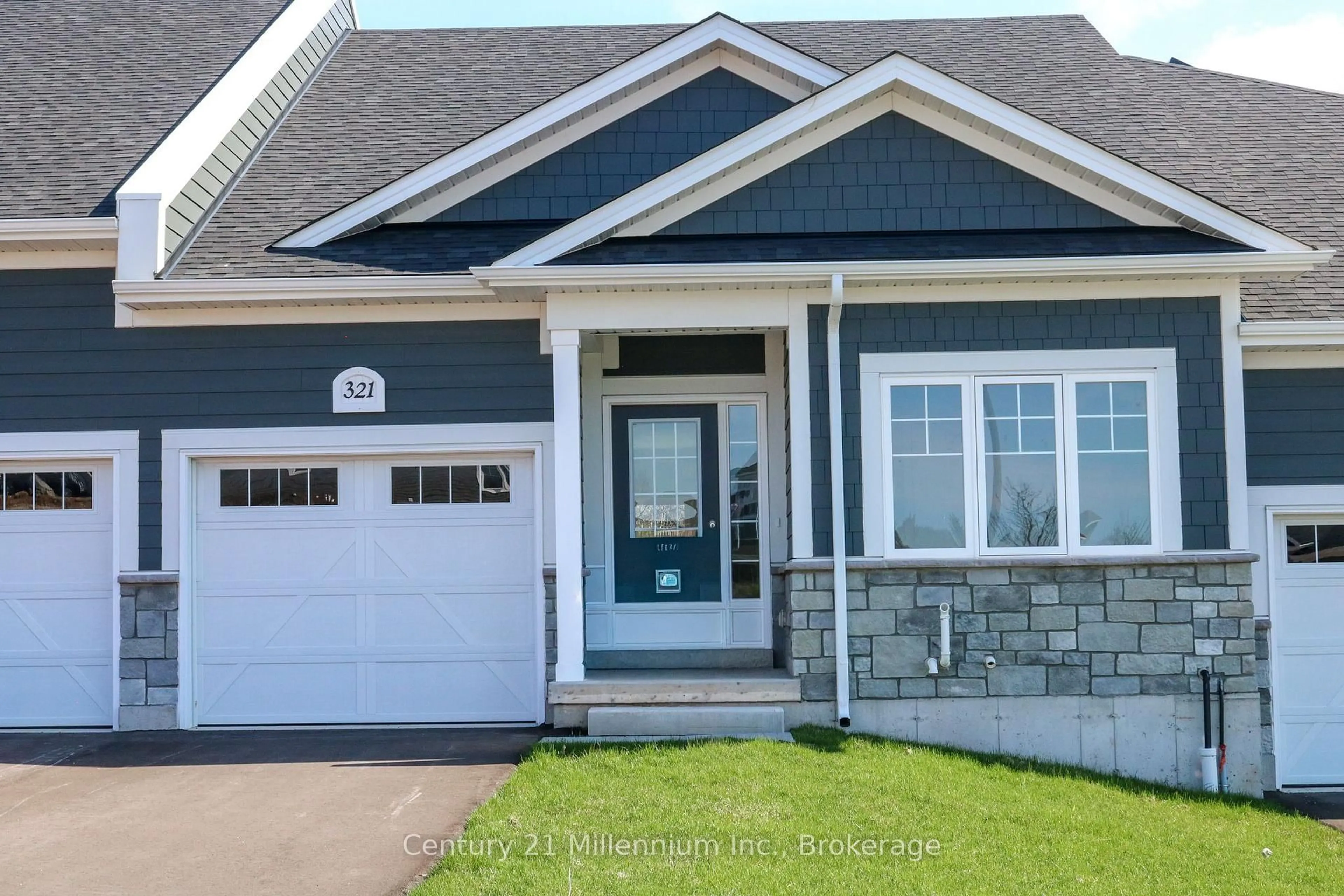 Home with vinyl exterior material, street for 321 Telford Tr, Georgian Bluffs Ontario N0H 1S0