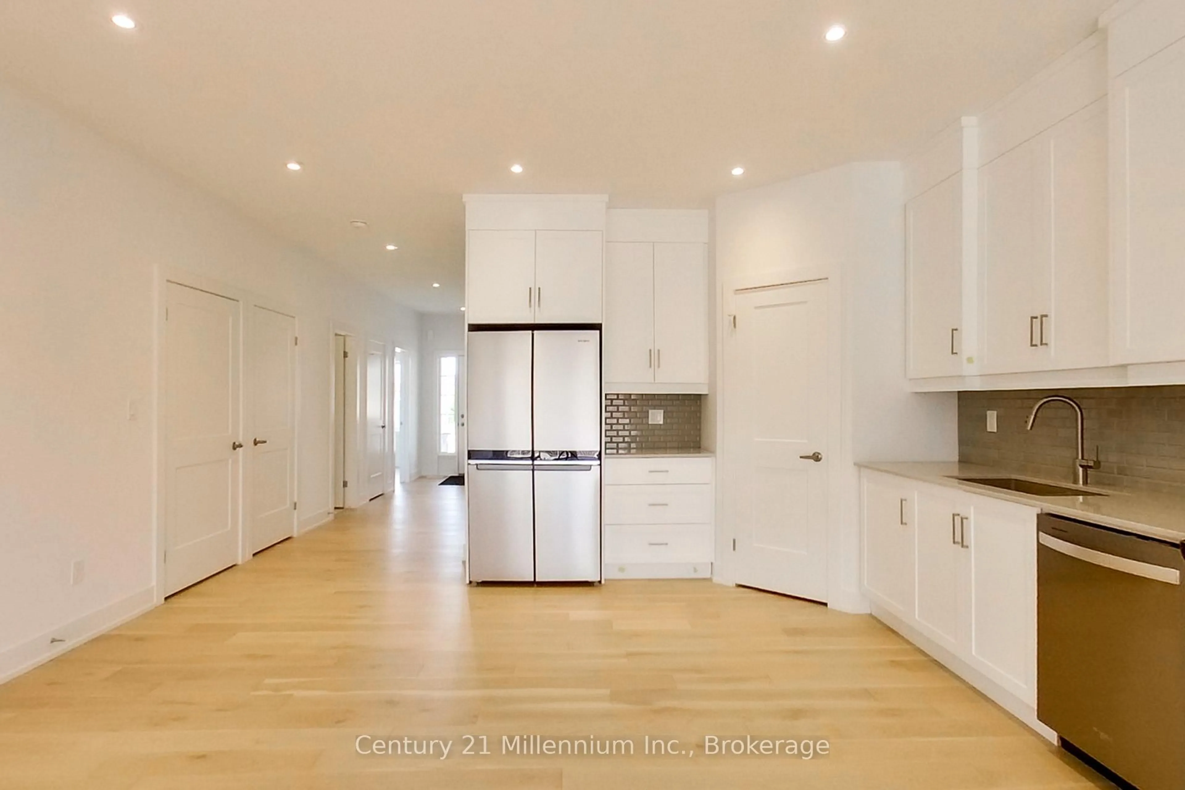 Open concept kitchen, wood/laminate floor for 321 Telford Tr, Georgian Bluffs Ontario N0H 1S0
