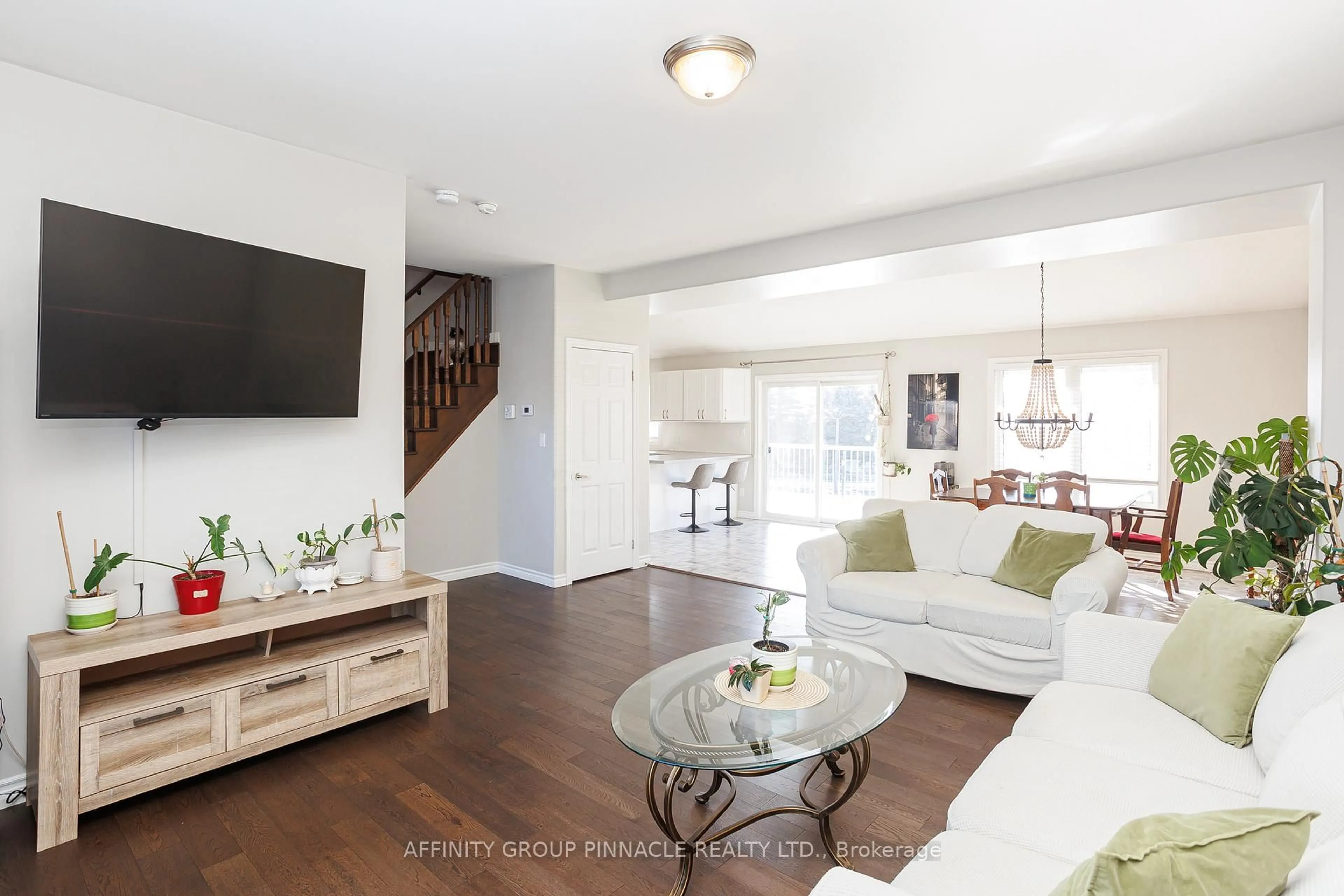Living room with furniture, wood/laminate floor for 11 Moynes Crt, Kawartha Lakes Ontario K9V 0L2