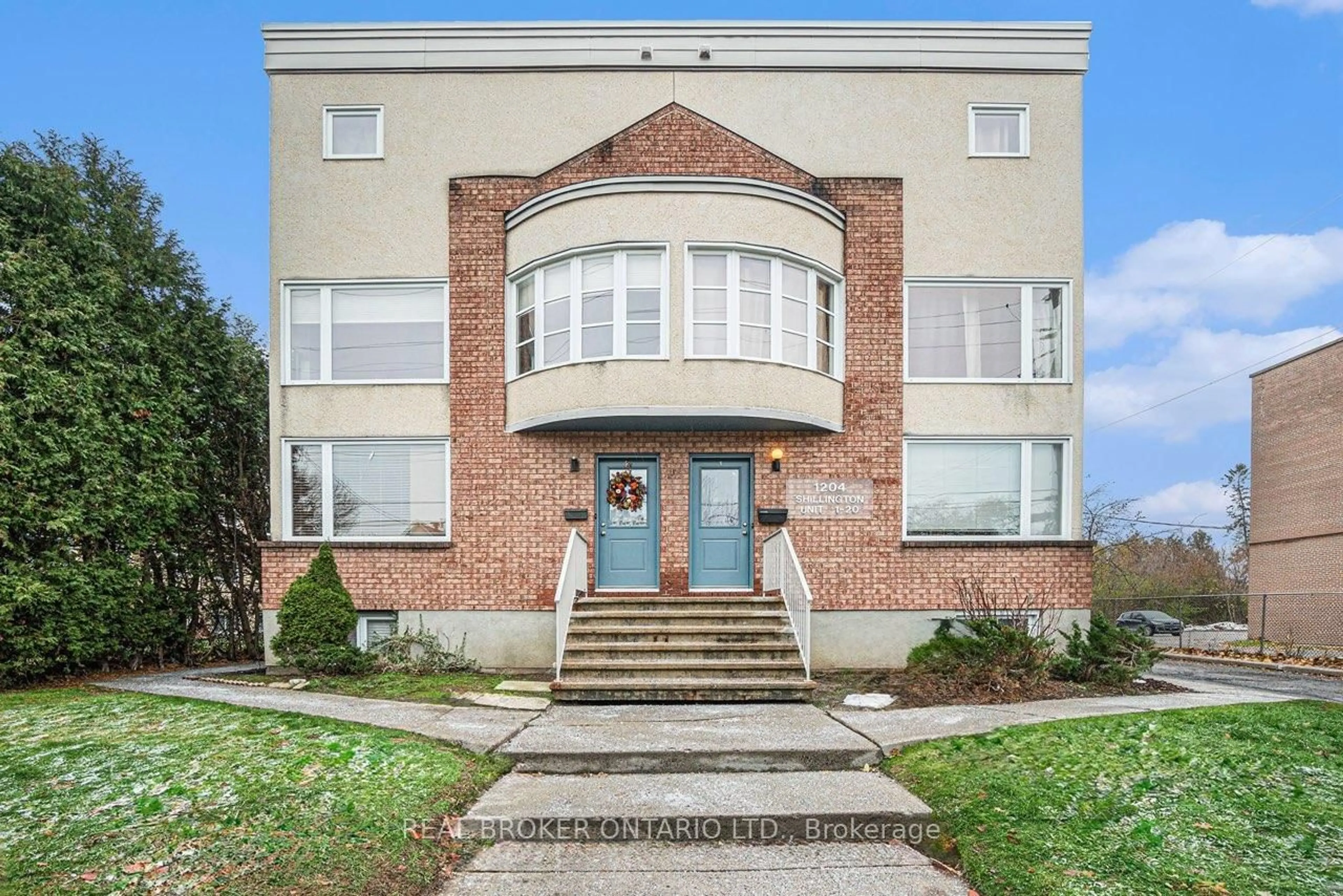 Home with brick exterior material, street for 1204 Shillington Ave #5, Ottawa Ontario K1Z 7Z4