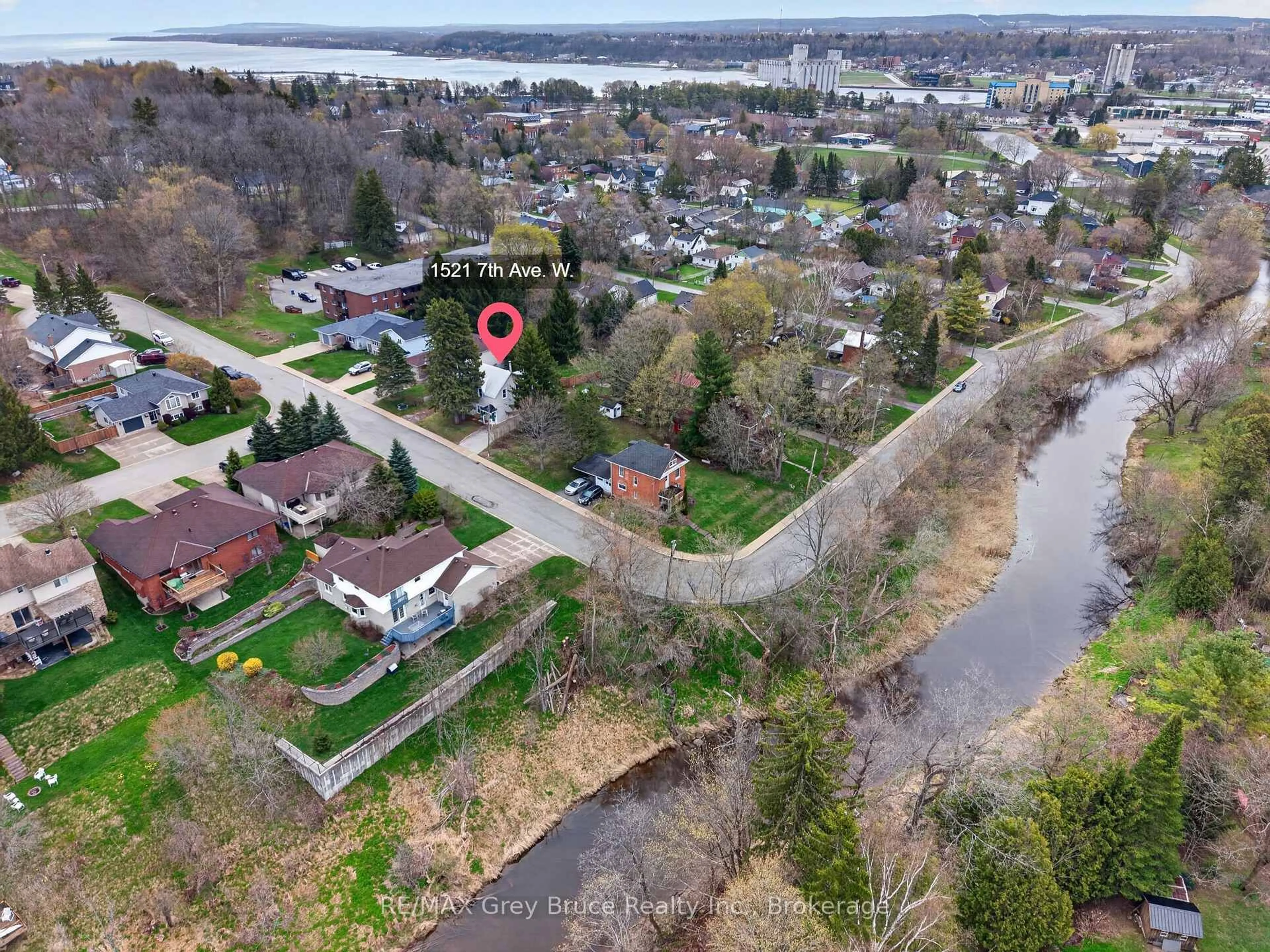 A pic from outside/outdoor area/front of a property/back of a property/a pic from drone, water/lake/river/ocean view for 1521 7th Ave, Owen Sound Ontario N4K 5L1