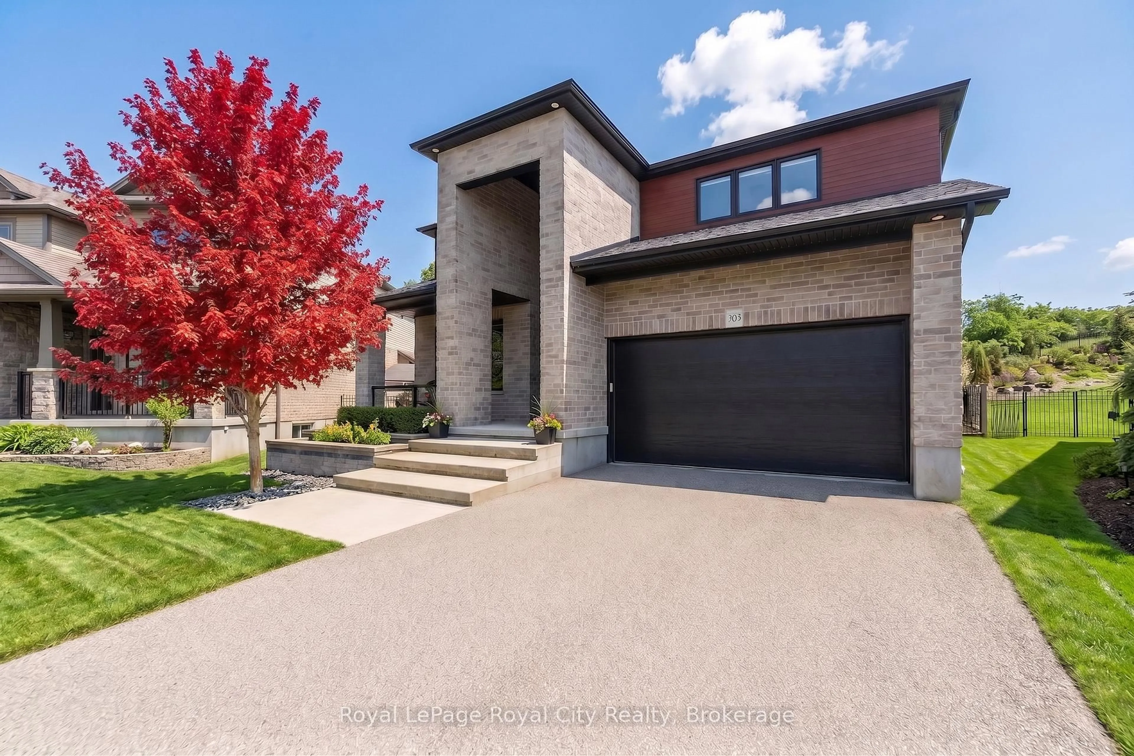Home with brick exterior material, street for 303 Gosling Gdns, Guelph Ontario N1L 0M1