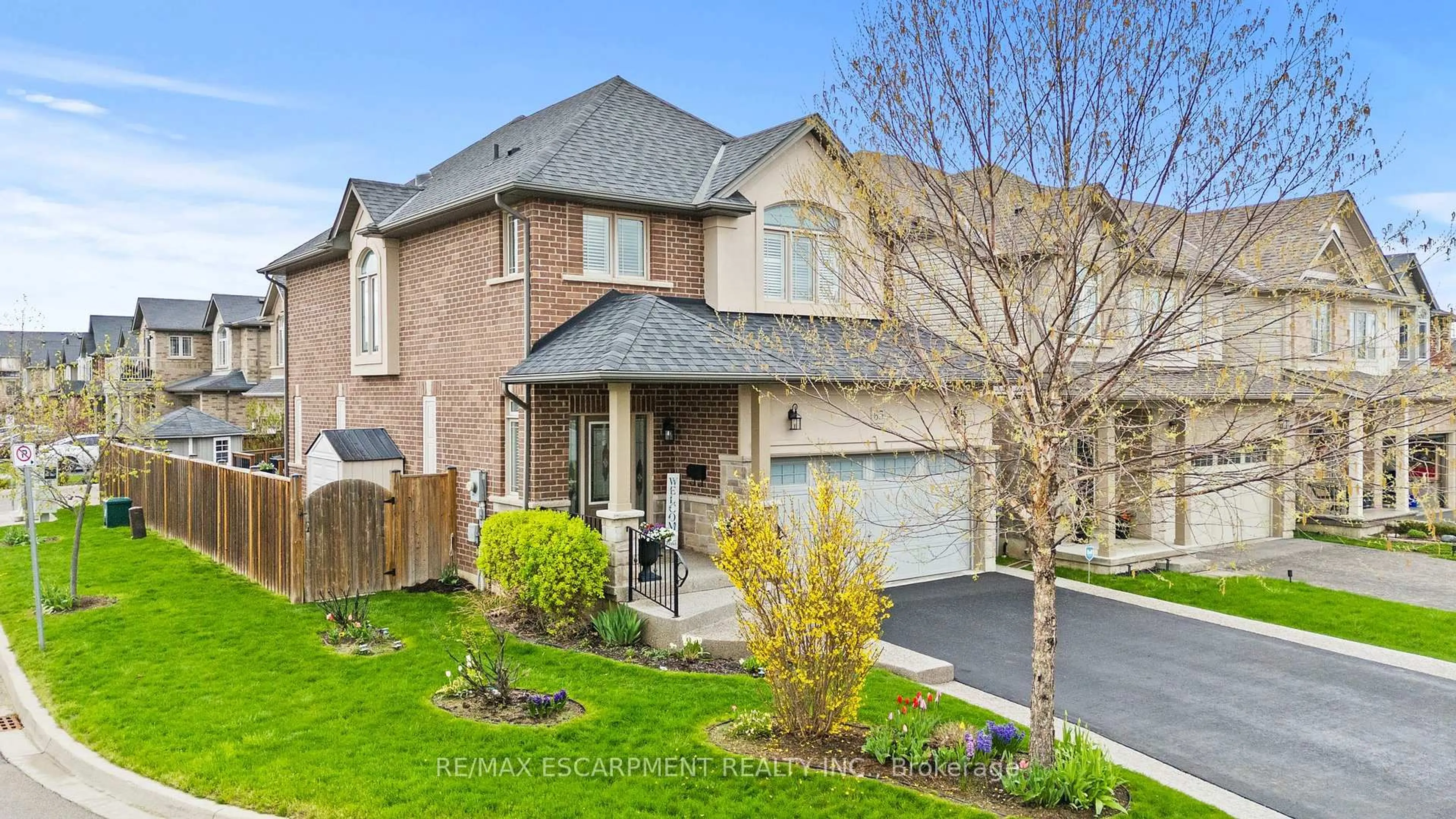 Home with brick exterior material, street for 65 Winslow Way, Hamilton Ontario L8J 0G9