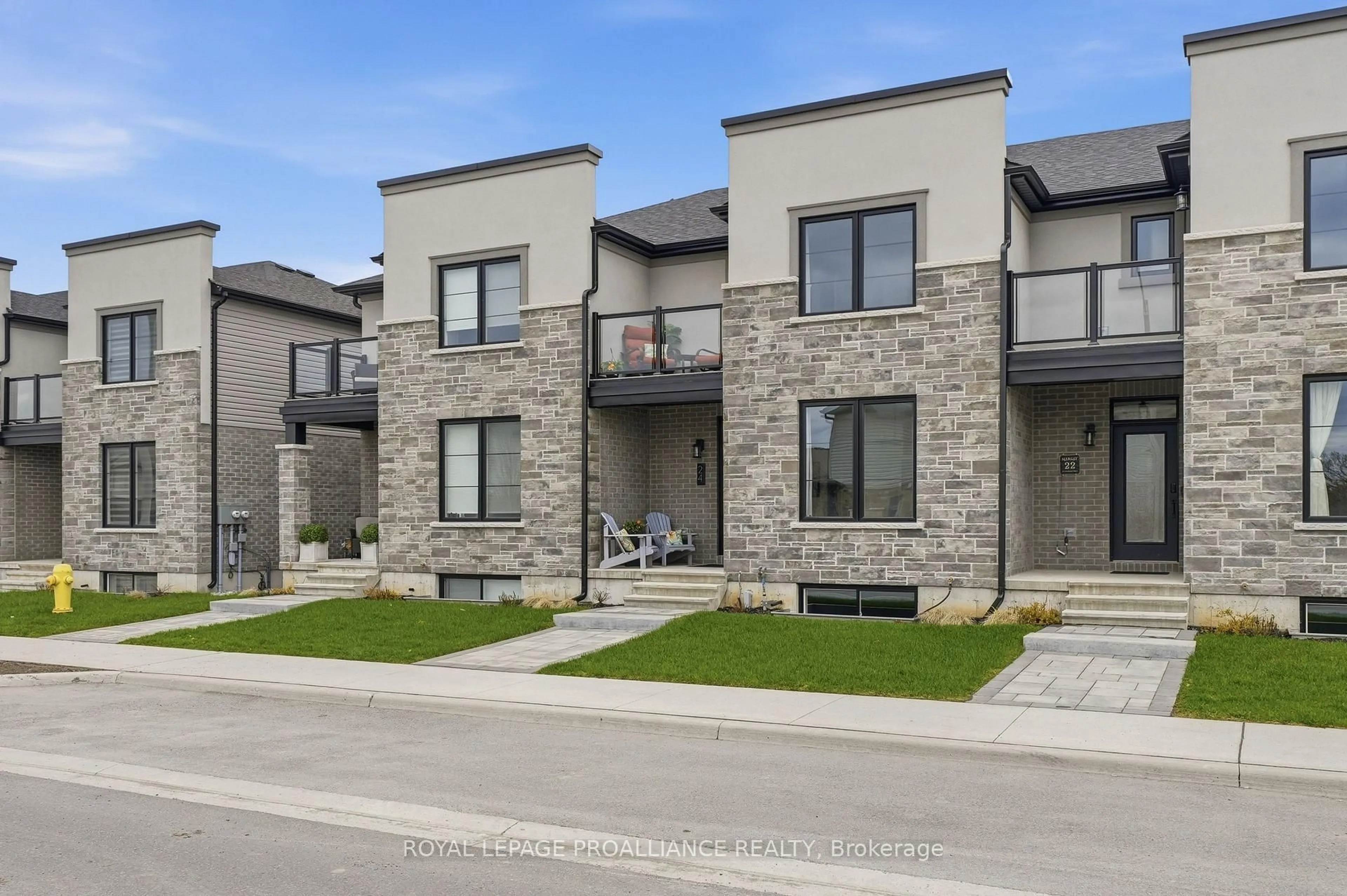 Home with brick exterior material, street for 24 Riverstone Way, Belleville Ontario K8N 0S6