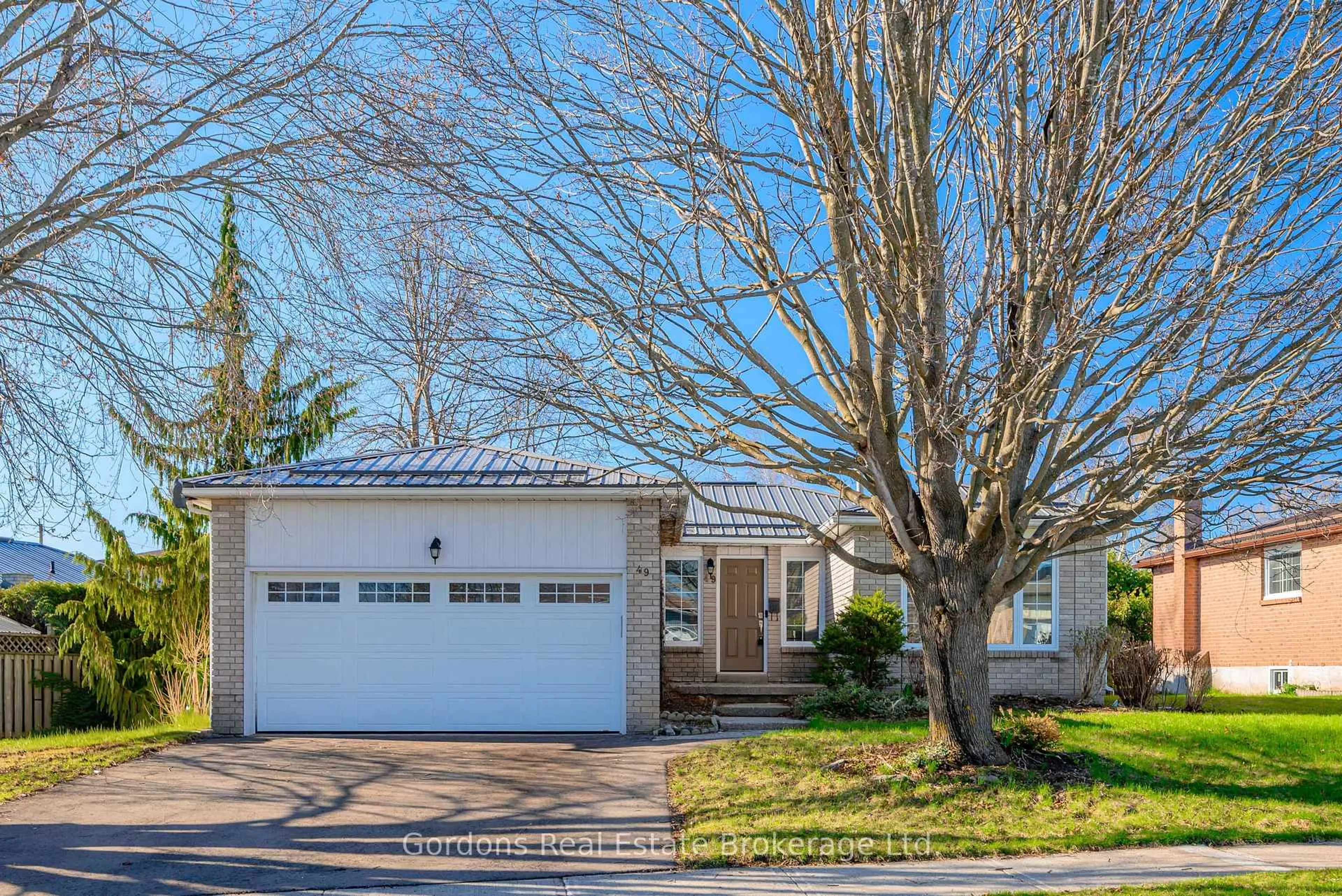 Home with vinyl exterior material, street for 49 Corneil St, Kawartha Lakes Ontario K9V 5T7