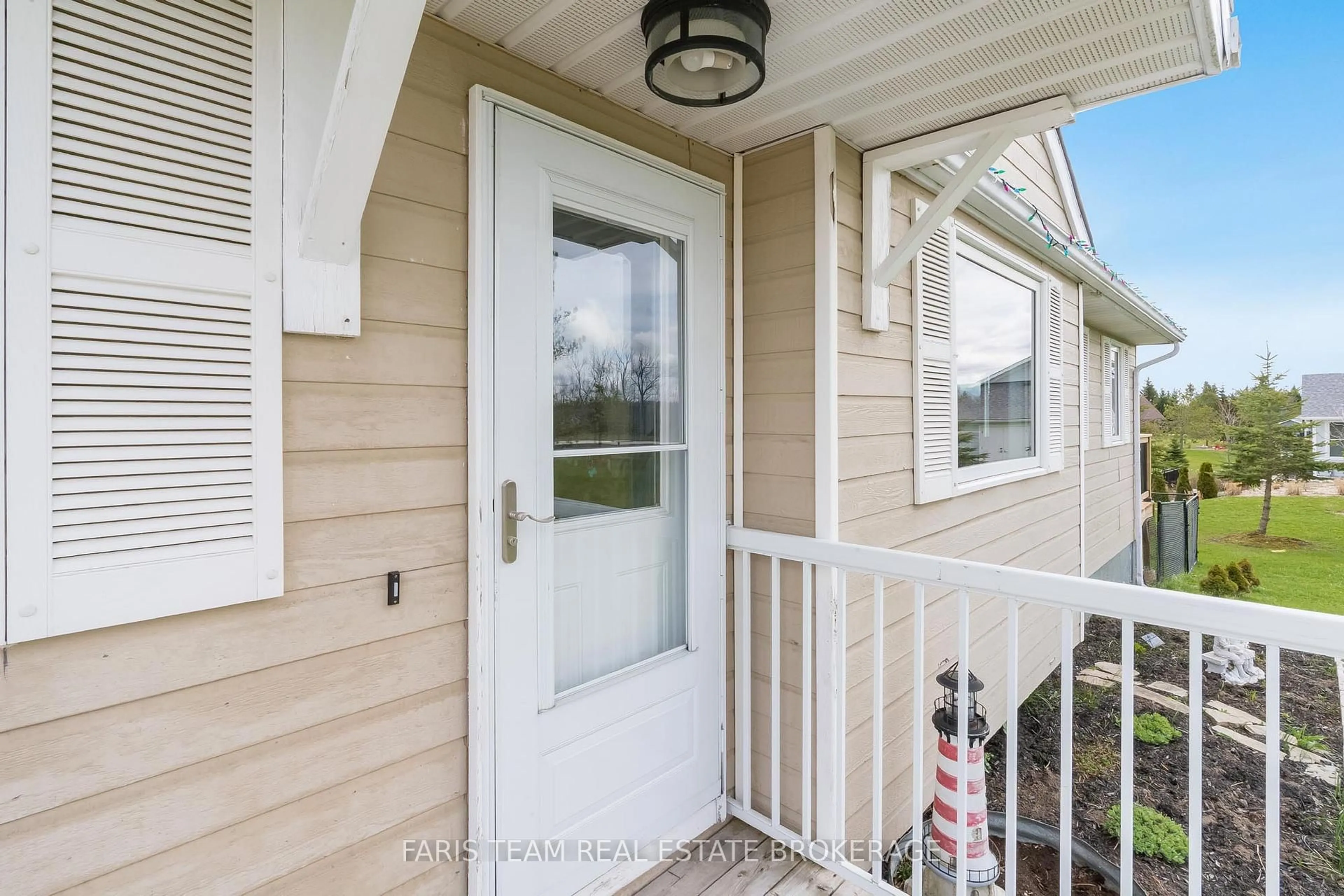 Home with vinyl exterior material, street for 157 Brewster Lake Rd, Grey Highlands Ontario N0C 1M0
