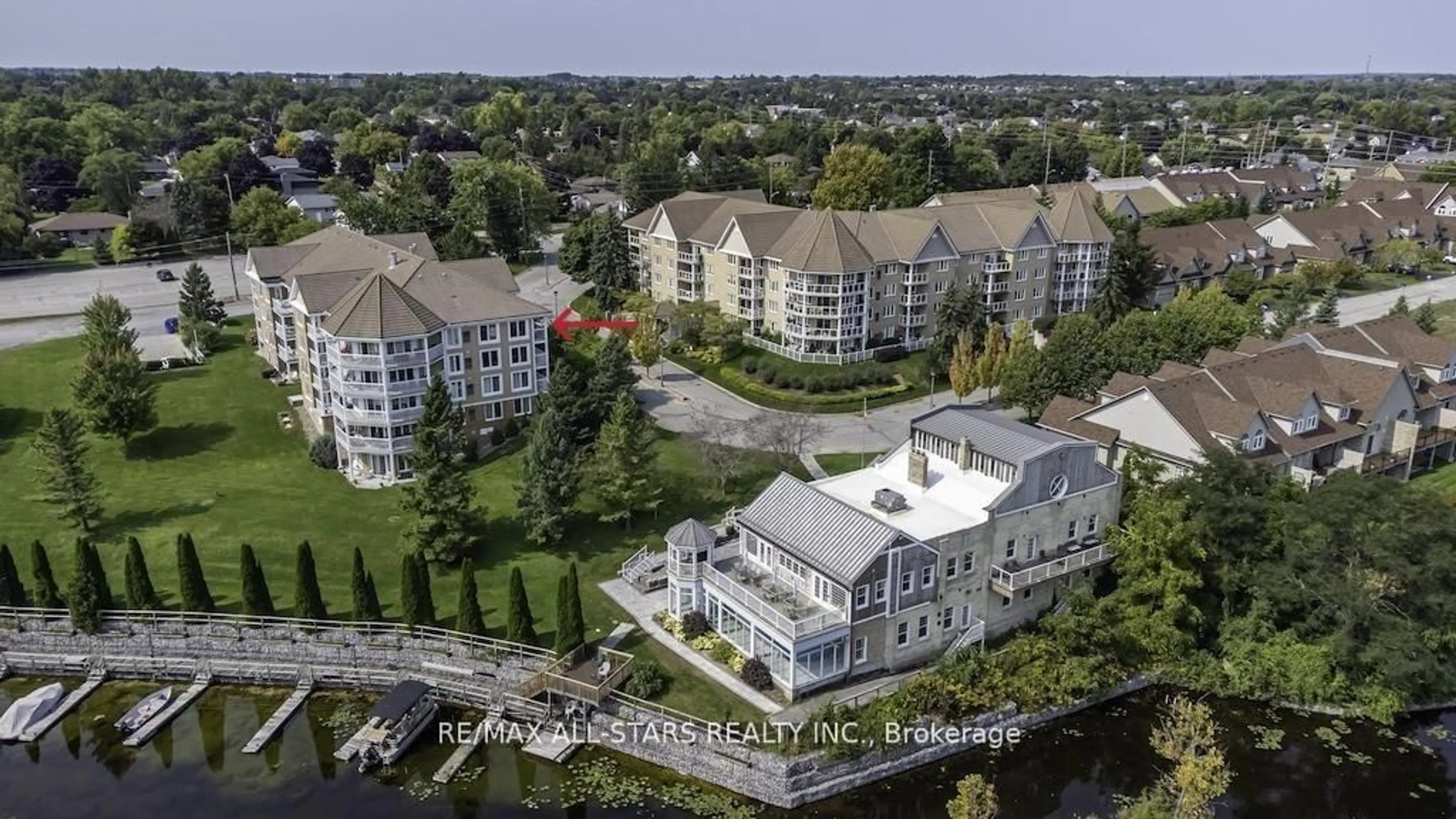 A pic from outside/outdoor area/front of a property/back of a property/a pic from drone, city buildings view from balcony for 50 Rivermill Blvd #408, Kawartha Lakes Ontario K9V 6C1