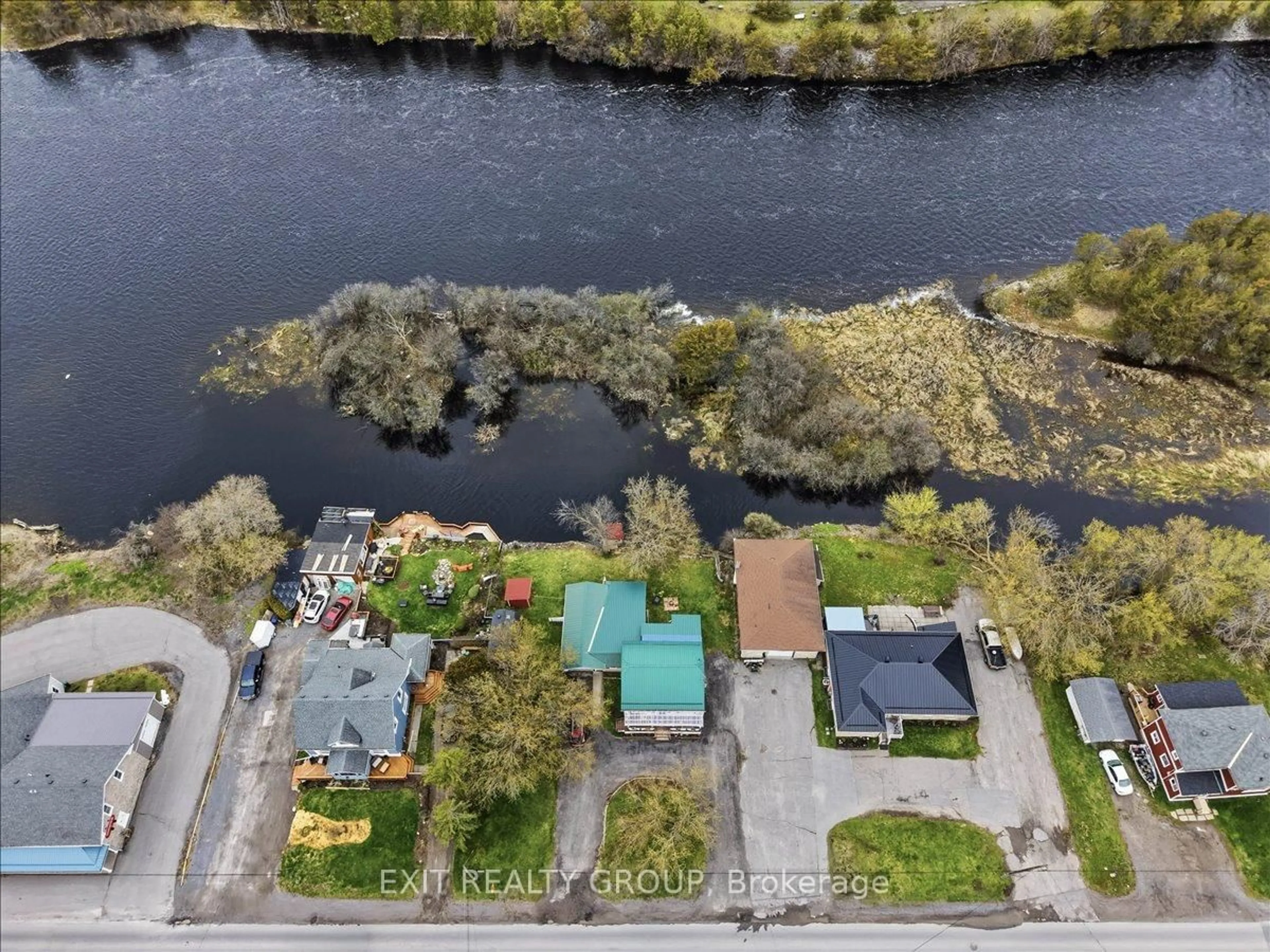 A pic from outside/outdoor area/front of a property/back of a property/a pic from drone, water/lake/river/ocean view for 59 Cannifton Rd, Belleville Ontario K8N 4Z6