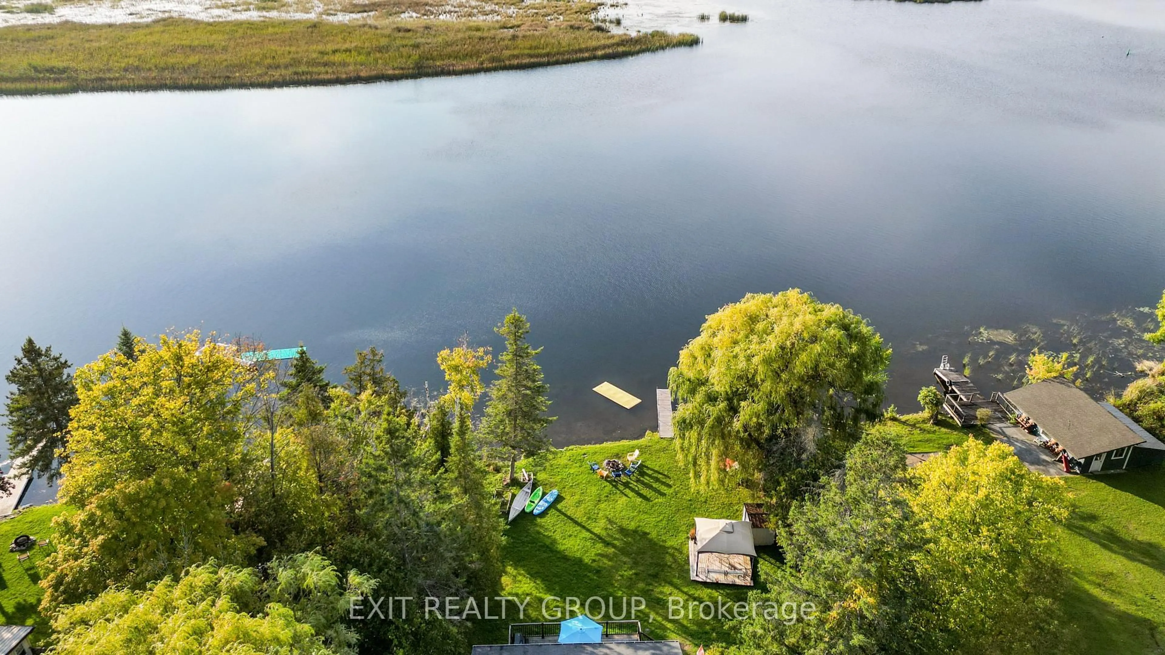 A pic from outside/outdoor area/front of a property/back of a property/a pic from drone, water/lake/river/ocean view for 50 Cedar Lane, Hastings Ontario K0K 2C0