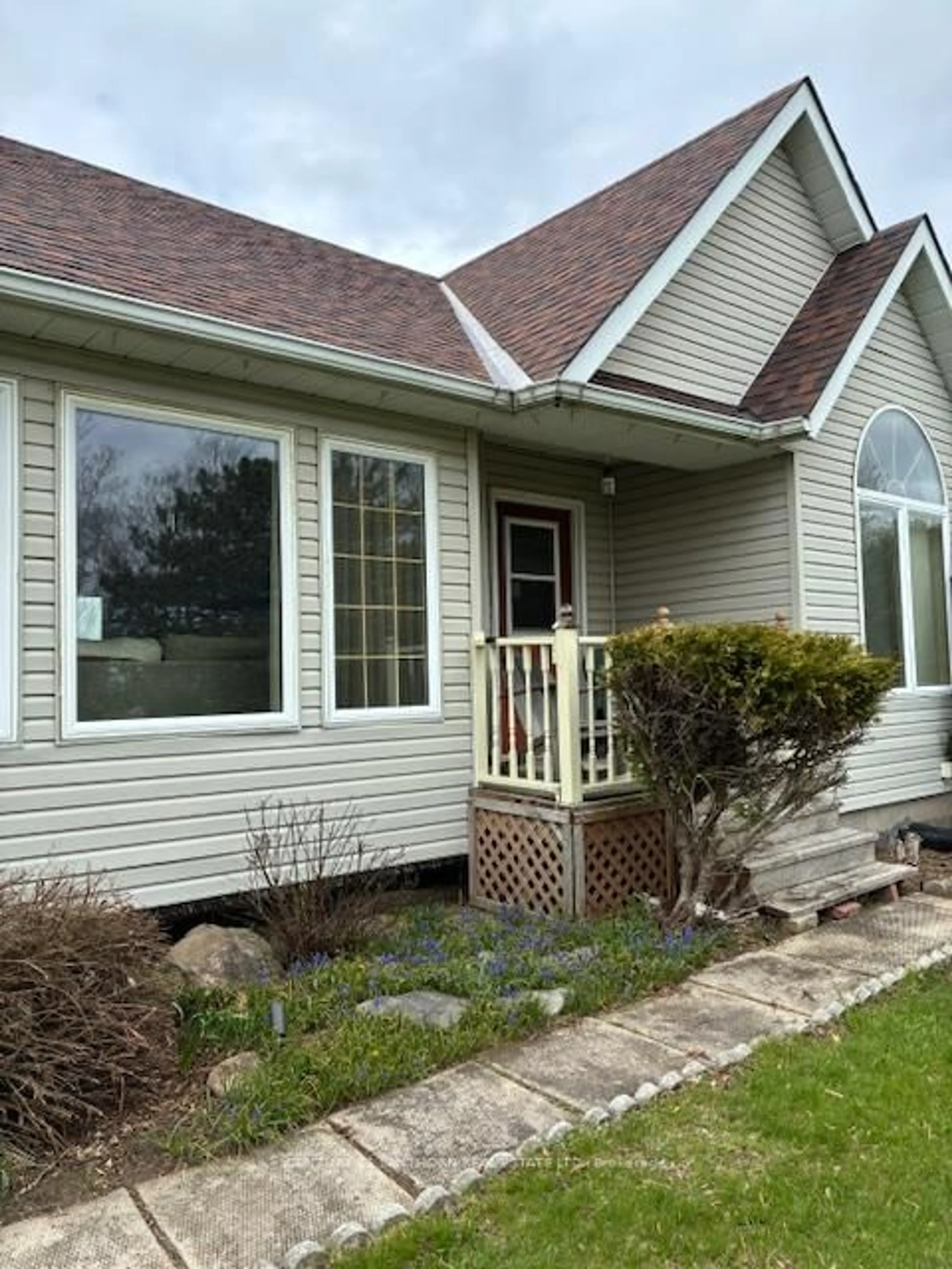 Home with vinyl exterior material, street for 51 B Jericho Rd, Prince Edward County Ontario K0K 1W0