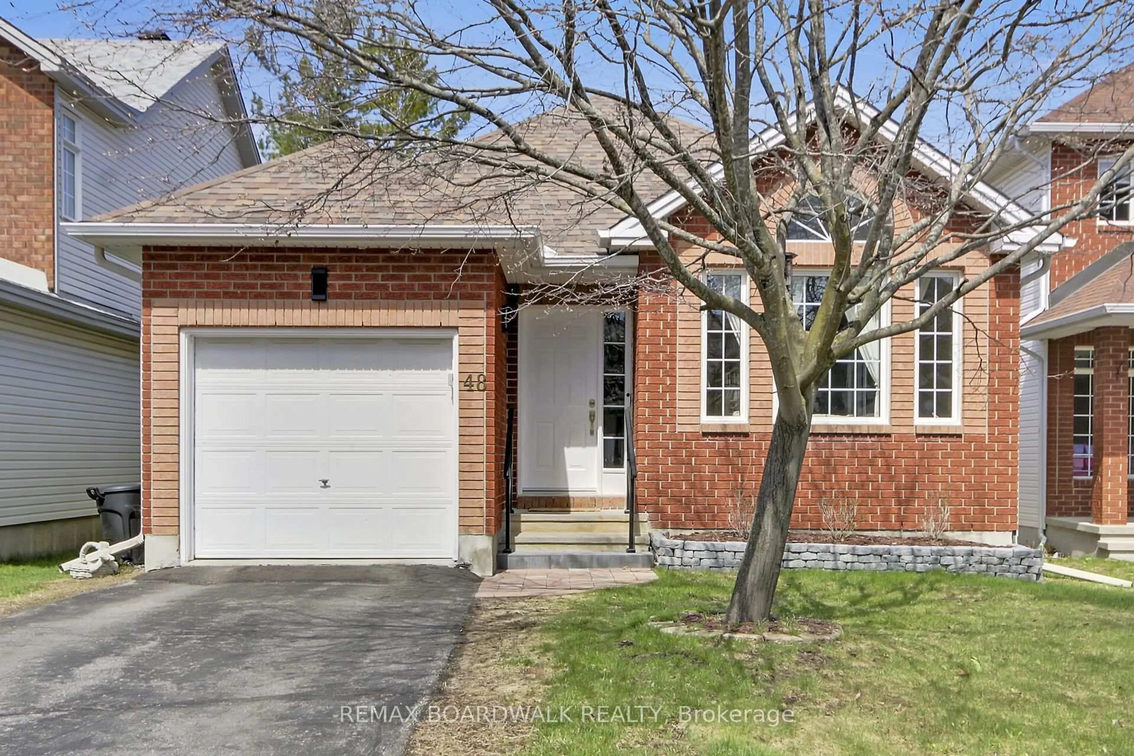 Home with brick exterior material, street for 48 Maricona Way, Ottawa Ontario K2T 1H2