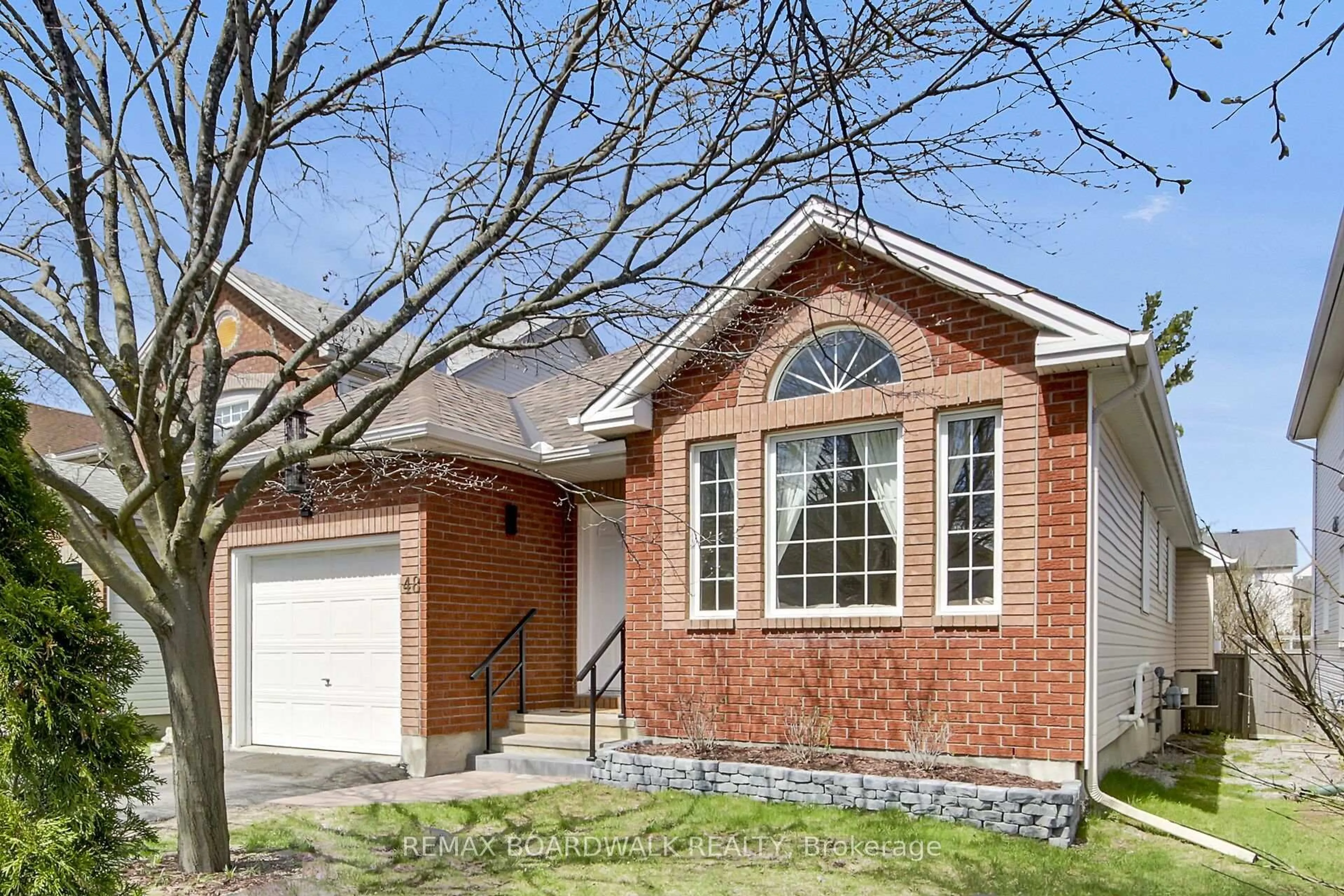 Home with brick exterior material, street for 48 Maricona Way, Ottawa Ontario K2T 1H2