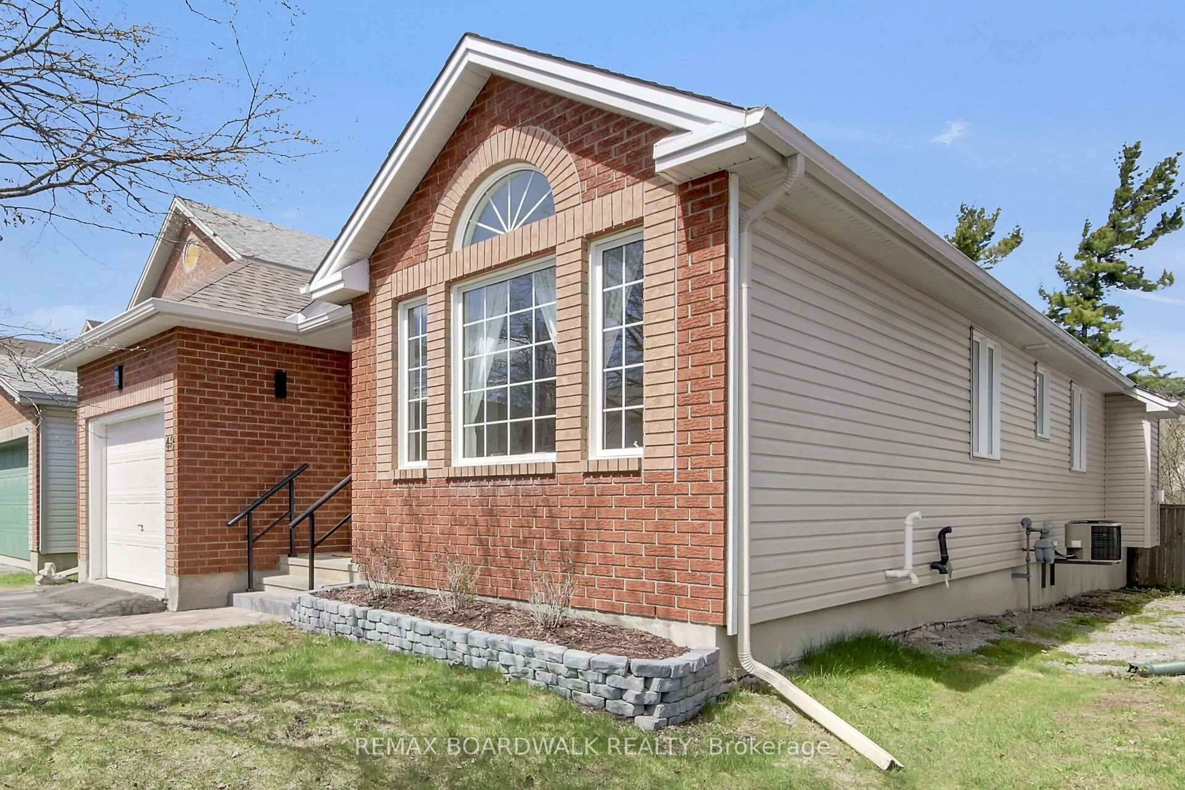 Home with brick exterior material, street for 48 Maricona Way, Ottawa Ontario K2T 1H2