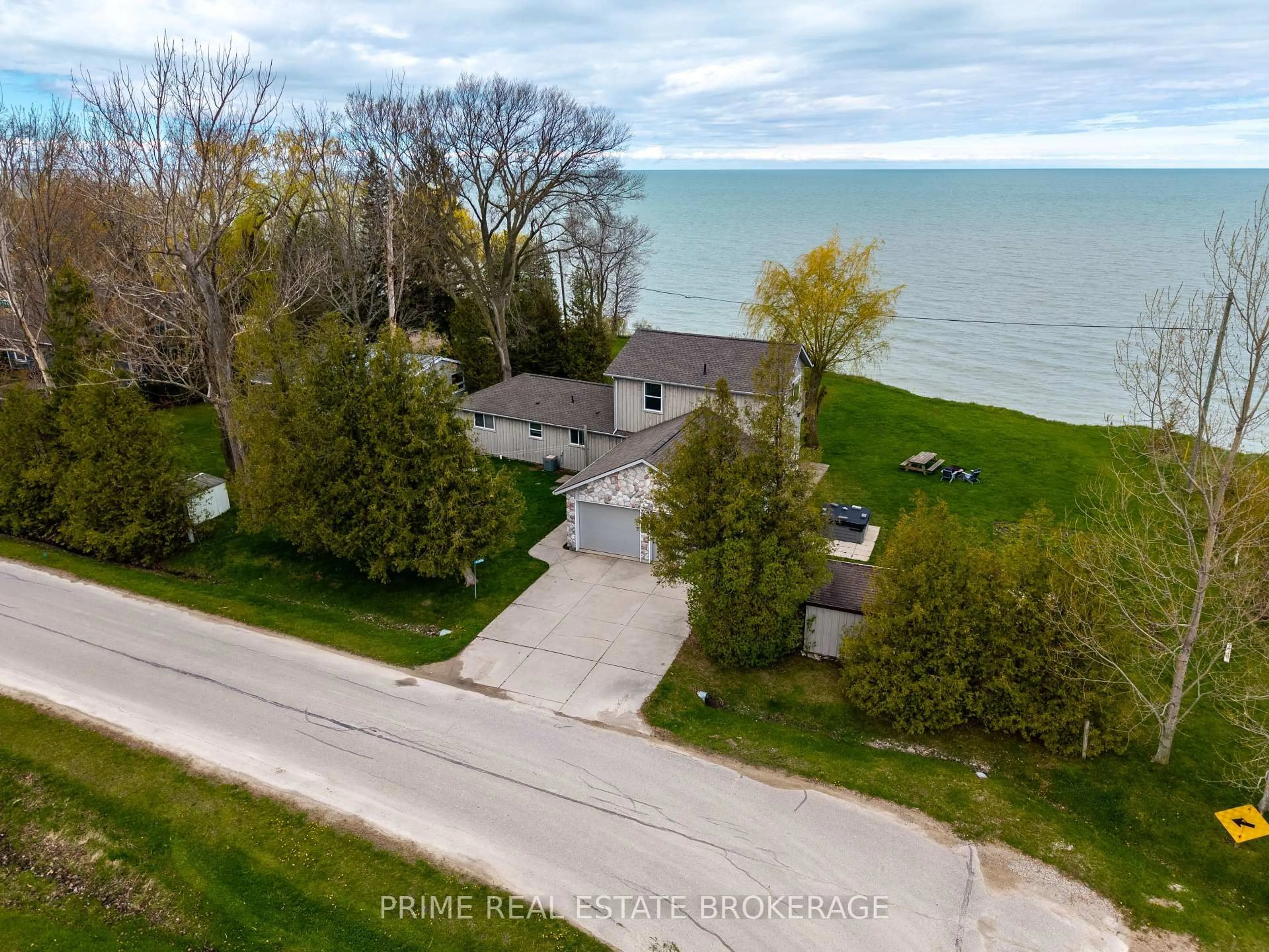 A pic from outside/outdoor area/front of a property/back of a property/a pic from drone, water/lake/river/ocean view for 71899 Sunridge Cres, Bluewater Ontario N0M 1N0