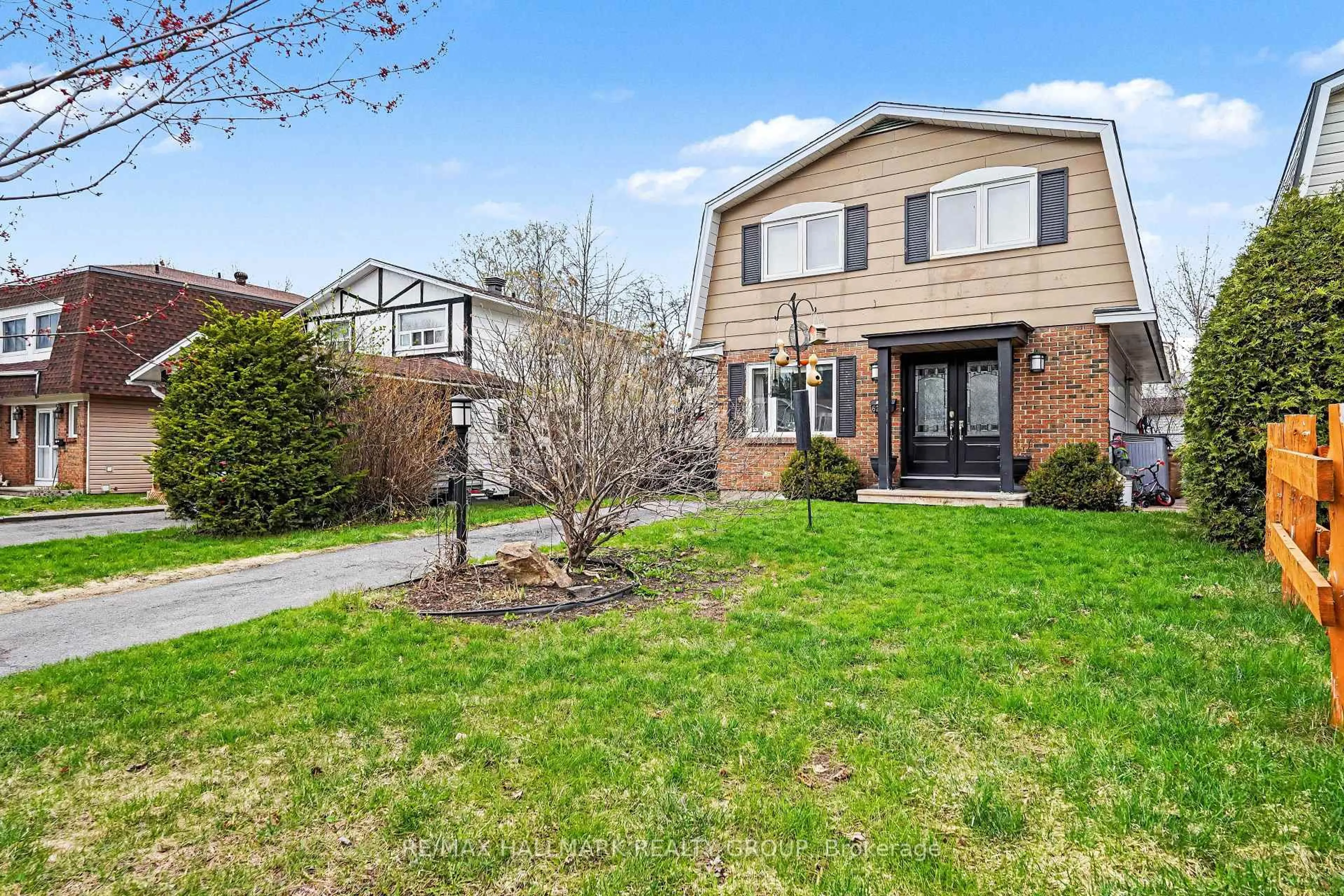 Home with brick exterior material, street for 62 Priam Way, Ottawa Ontario K2H 8S8
