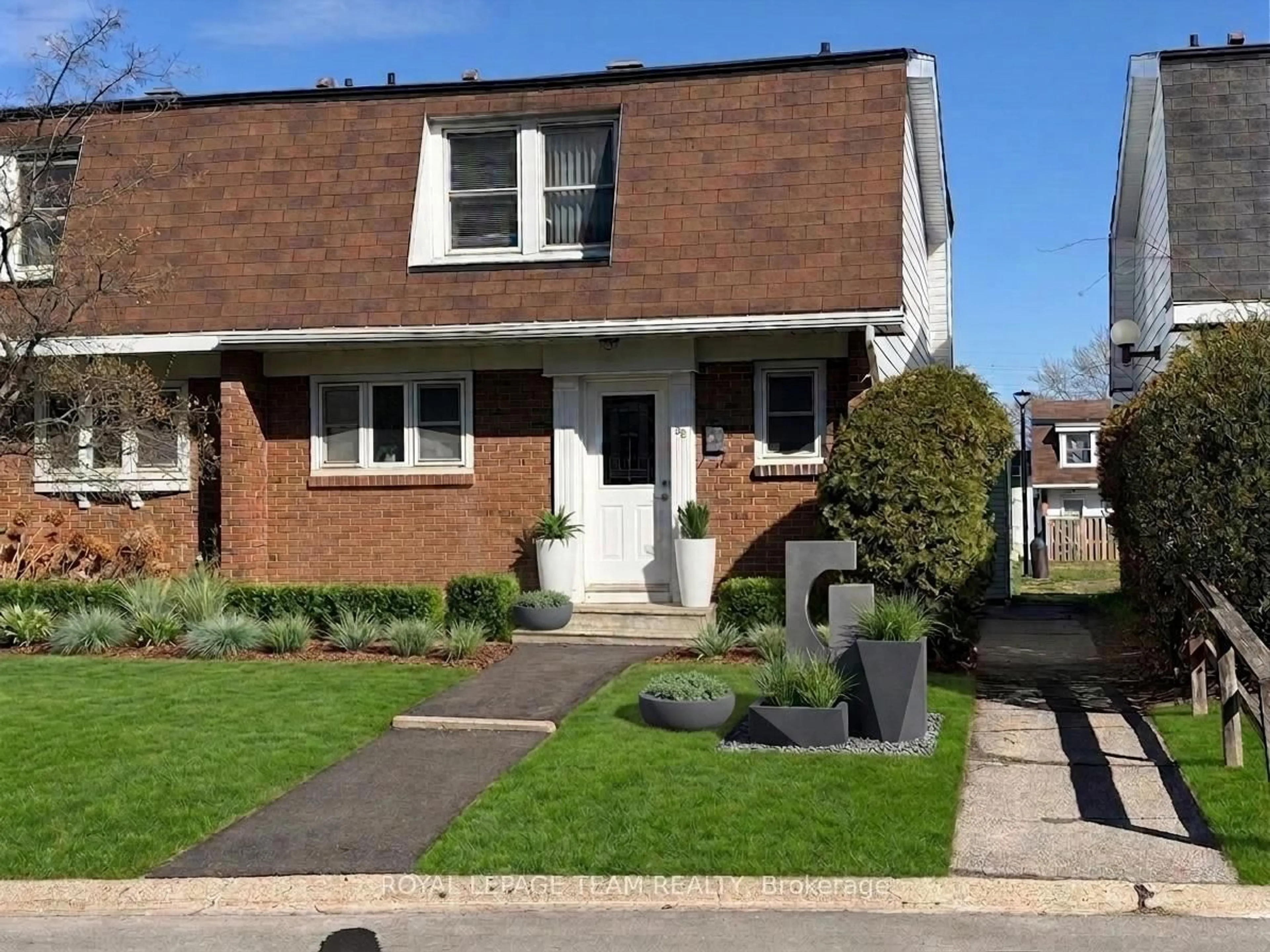 Home with brick exterior material, street for 920 Dynes Rd #55, Ottawa Ontario K2C 0G8