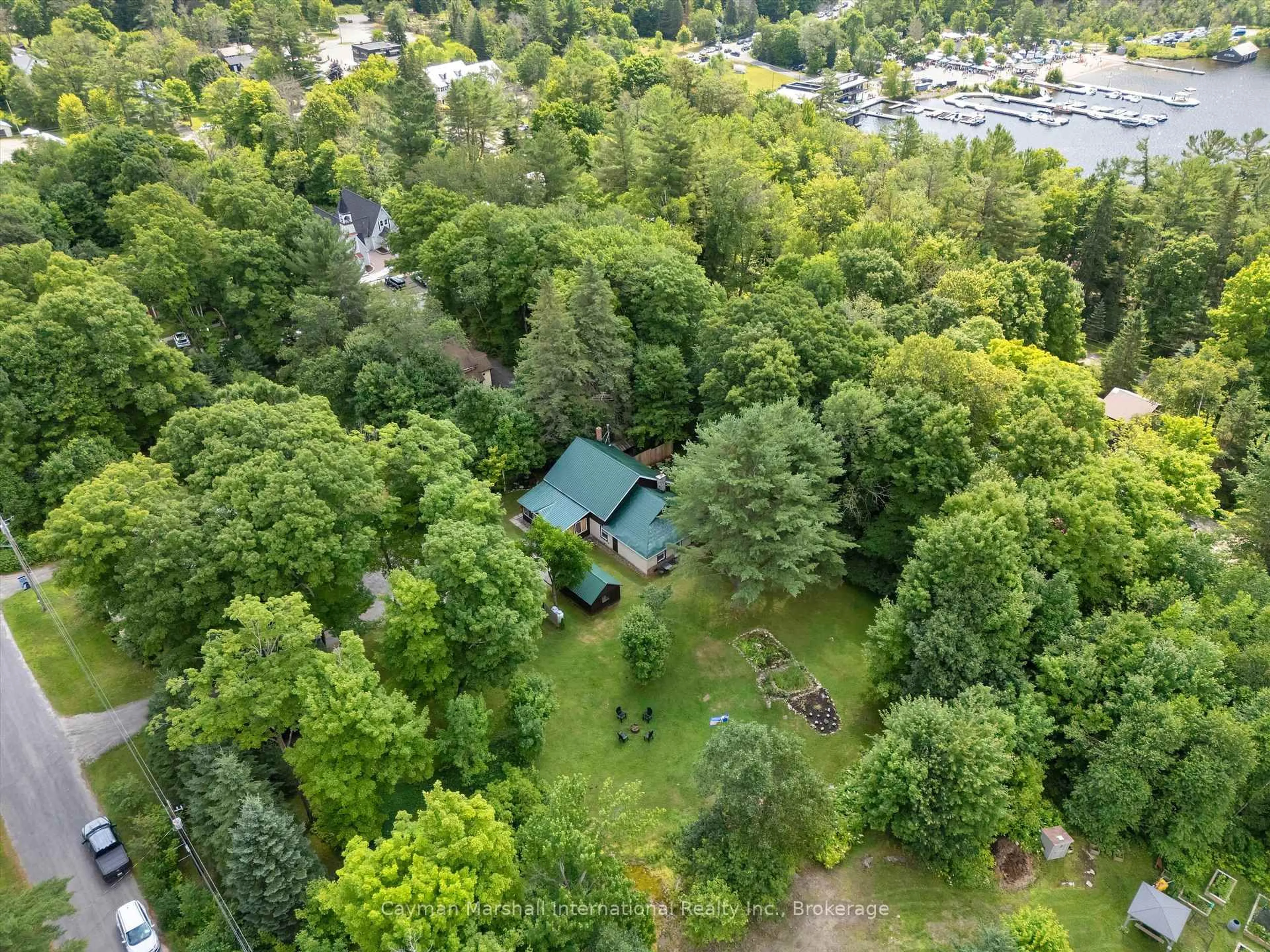A pic from outside/outdoor area/front of a property/back of a property/a pic from drone, forest/trees view for 15 Victoria St, Seguin Ontario P0C 1J0