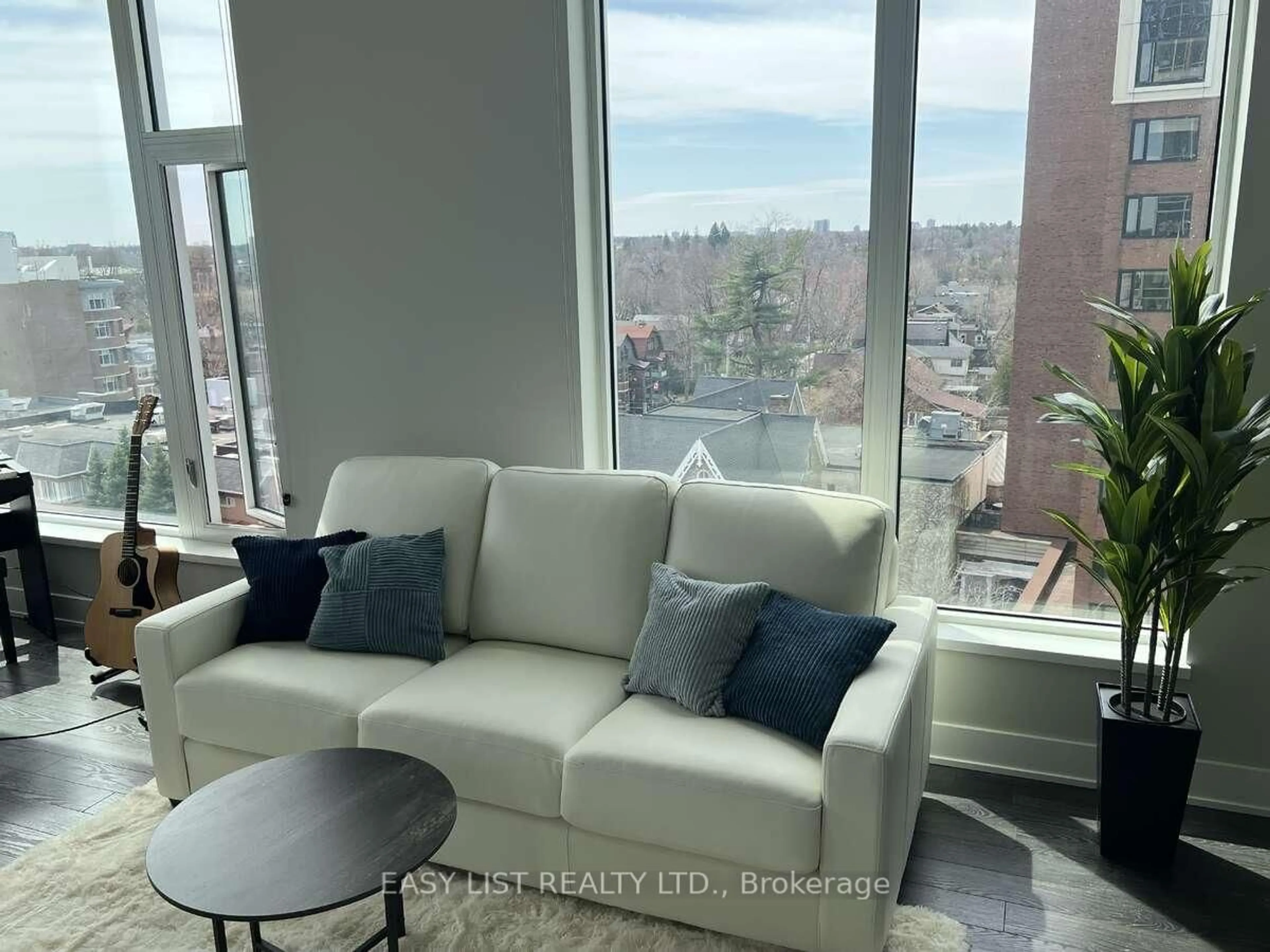 Living room with furniture, unknown for 118 Holmwood Ave #705, Ottawa Ontario K1S 5J5