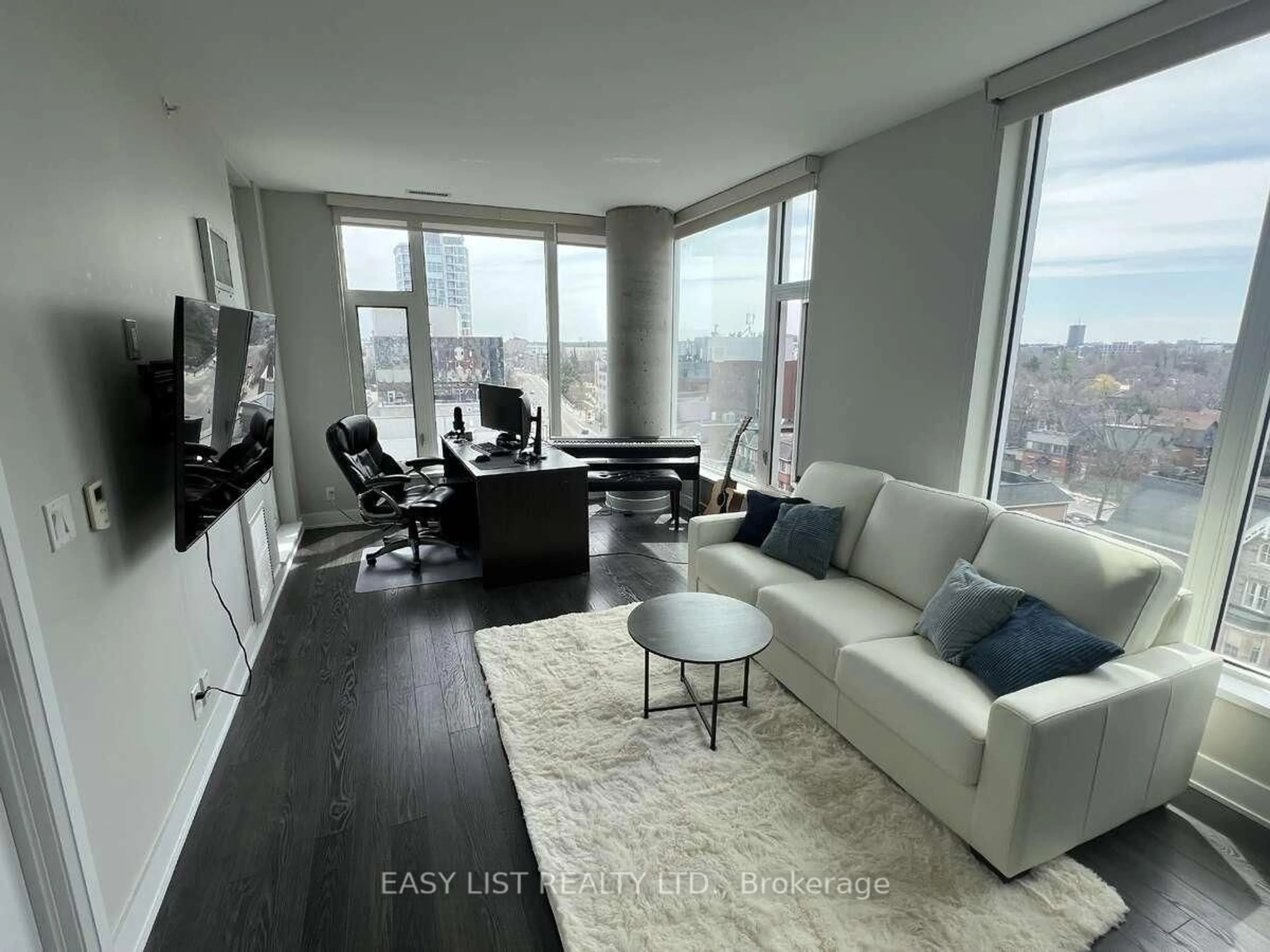 Living room with furniture, unknown for 118 Holmwood Ave #705, Ottawa Ontario K1S 5J5