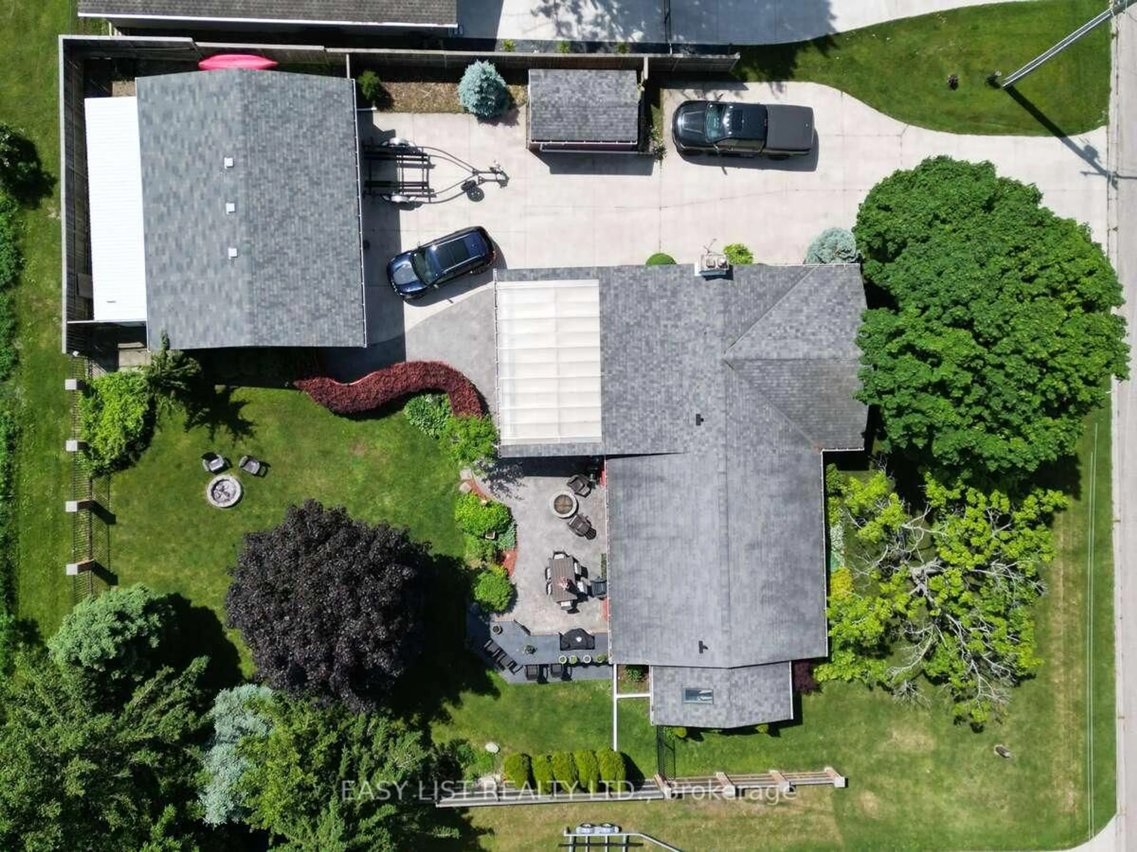 A pic from outside/outdoor area/front of a property/back of a property/a pic from drone, street for 7652 Harris Point Dr, Plympton-Wyoming Ontario N0N 1J6