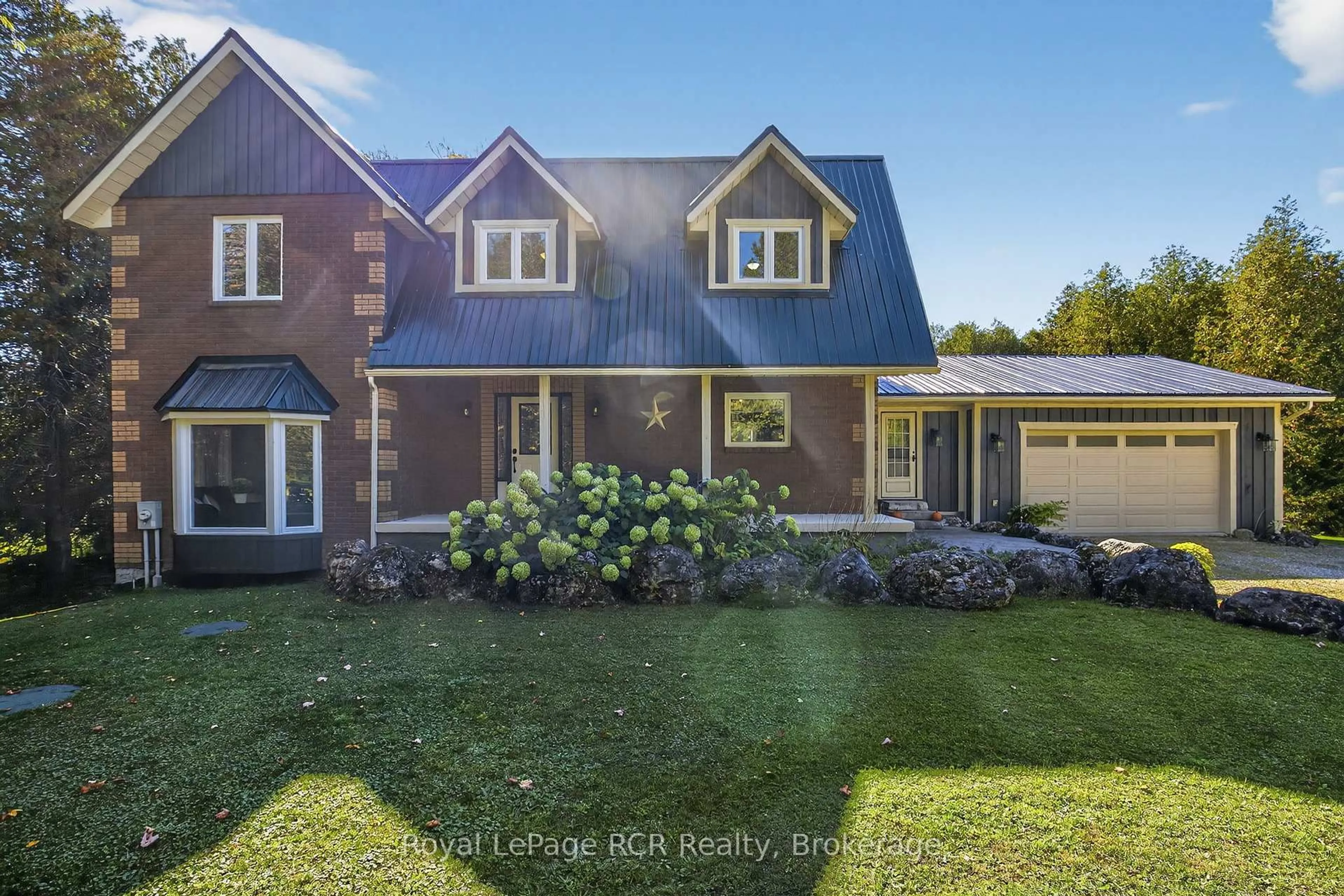 A pic from outside/outdoor area/front of a property/back of a property/a pic from drone, street for 468080 Concession 12B Concession, Grey Highlands Ontario N0C 1C0