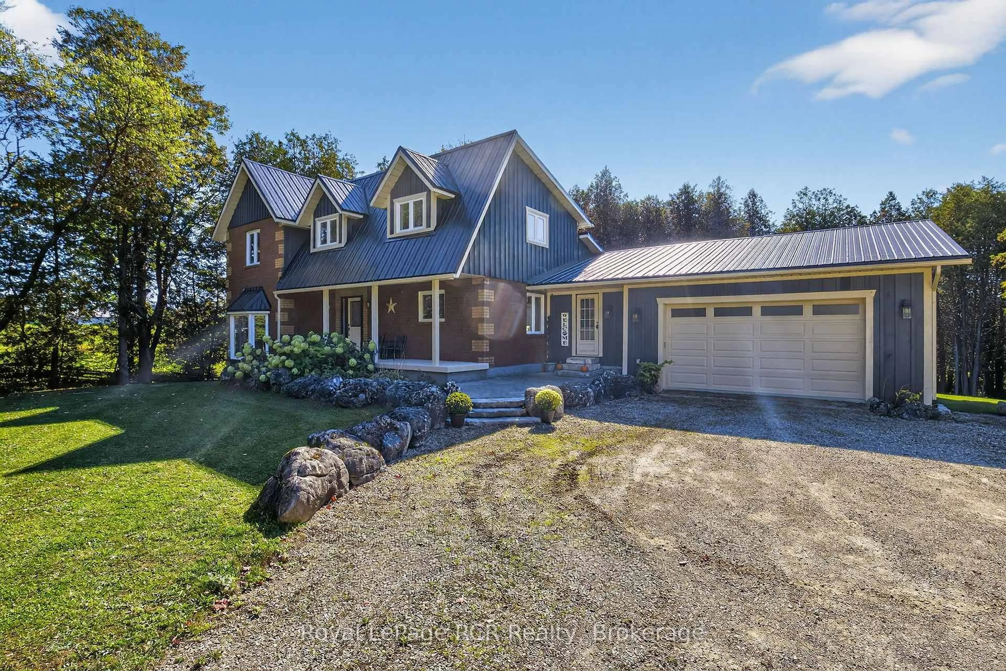 A pic from outside/outdoor area/front of a property/back of a property/a pic from drone, street for 468080 Concession 12B Concession, Grey Highlands Ontario N0C 1C0