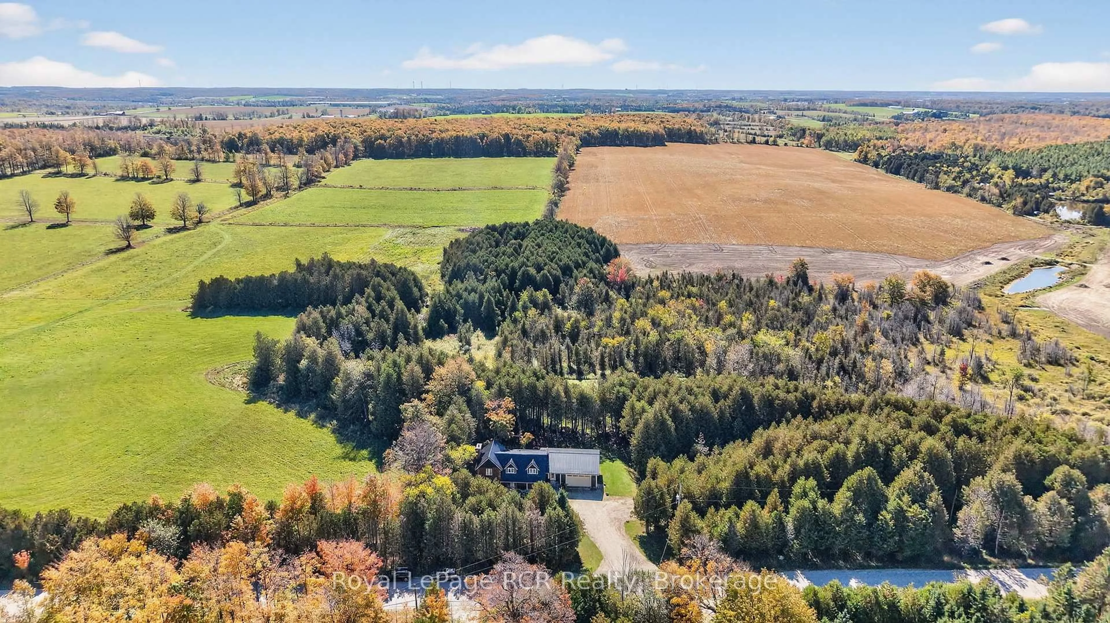 A pic from outside/outdoor area/front of a property/back of a property/a pic from drone, water/lake/river/ocean view for 468080 Concession 12B Concession, Grey Highlands Ontario N0C 1C0