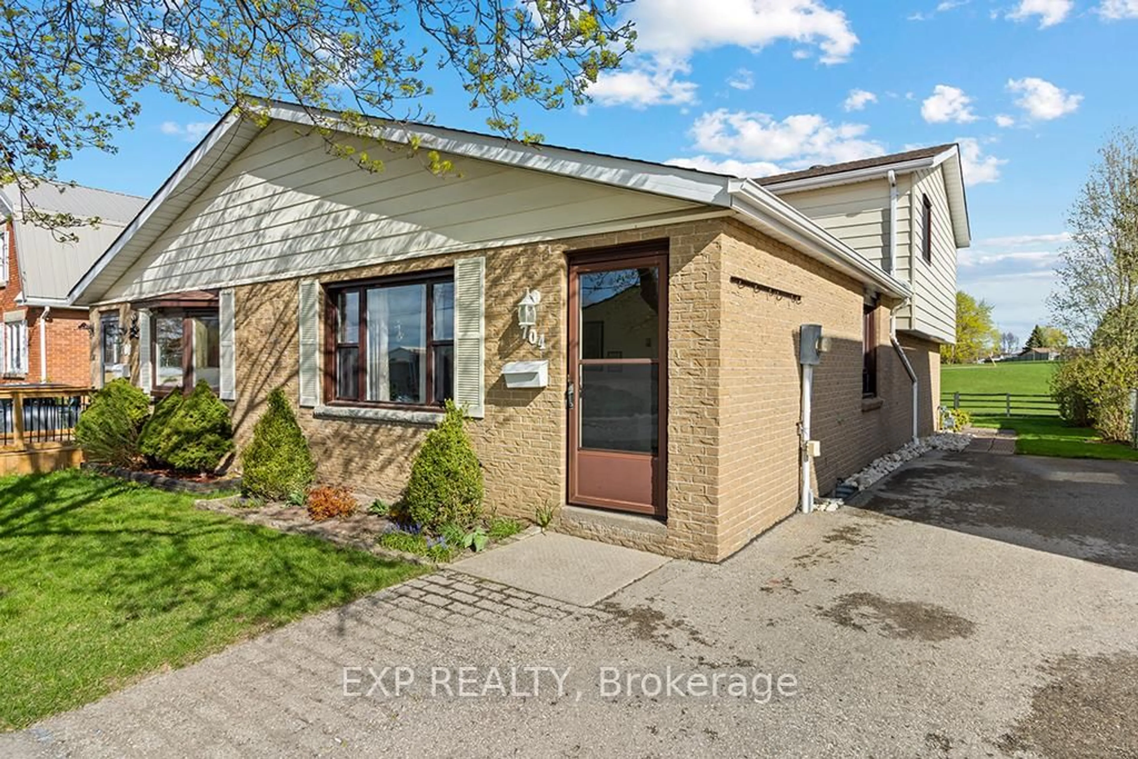 Home with brick exterior material, street for 704 11th St, Hanover Ontario N4N 3J4