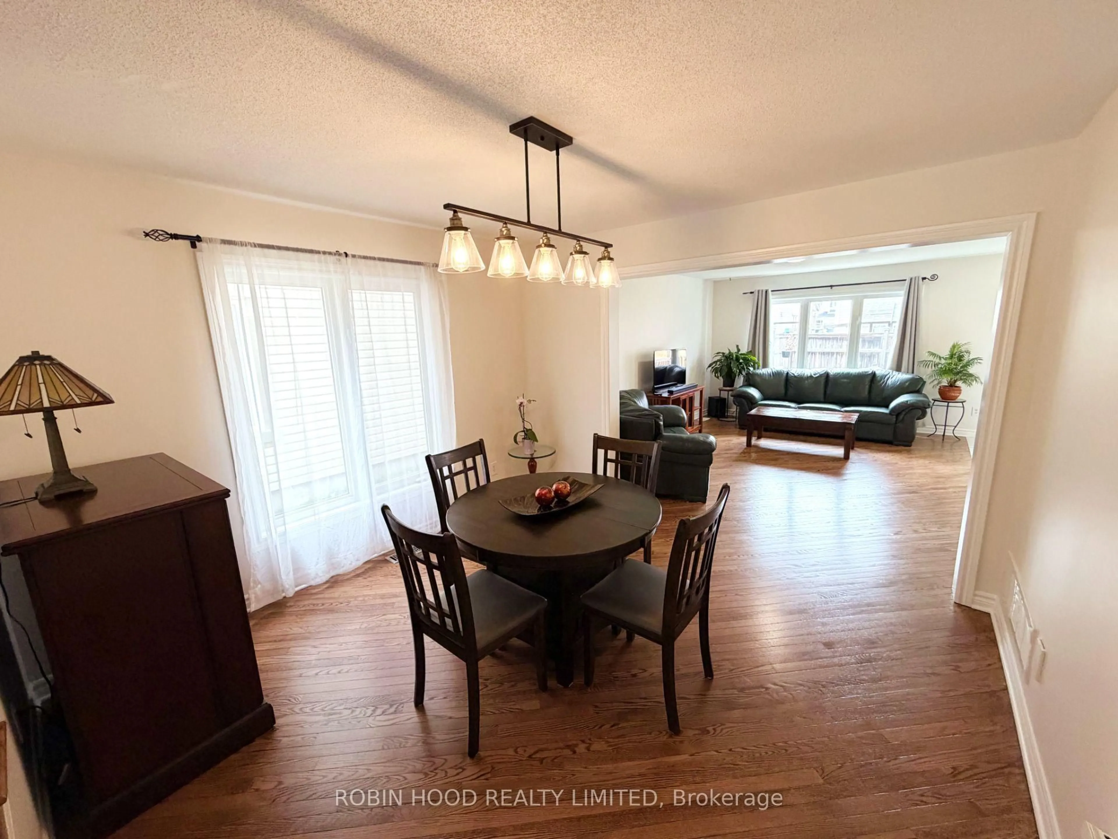 Dining room, wood/laminate floor for 3631 Cambrian Rd, Ottawa Ontario K2J 0S6