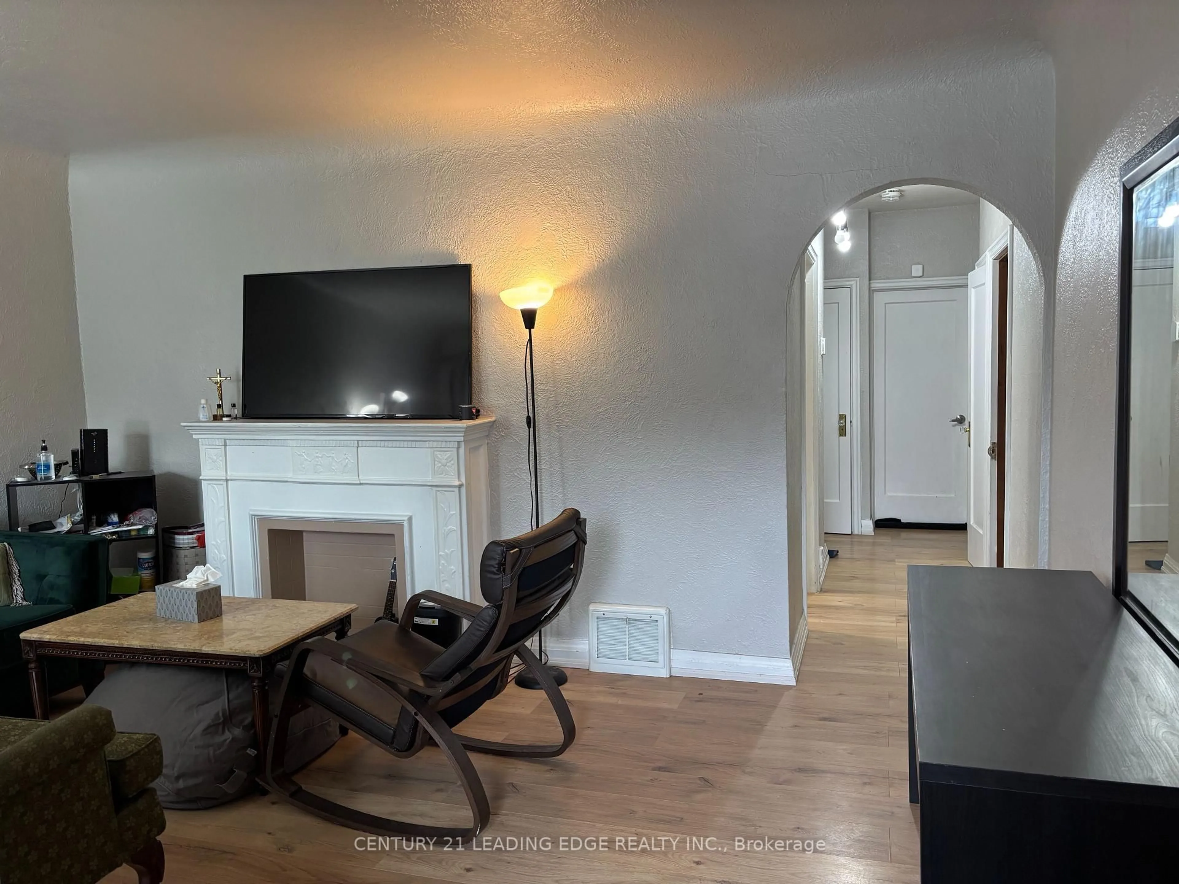 Living room with furniture, wood/laminate floor for 106 Whitney Ave, Hamilton Ontario L8S 2G5