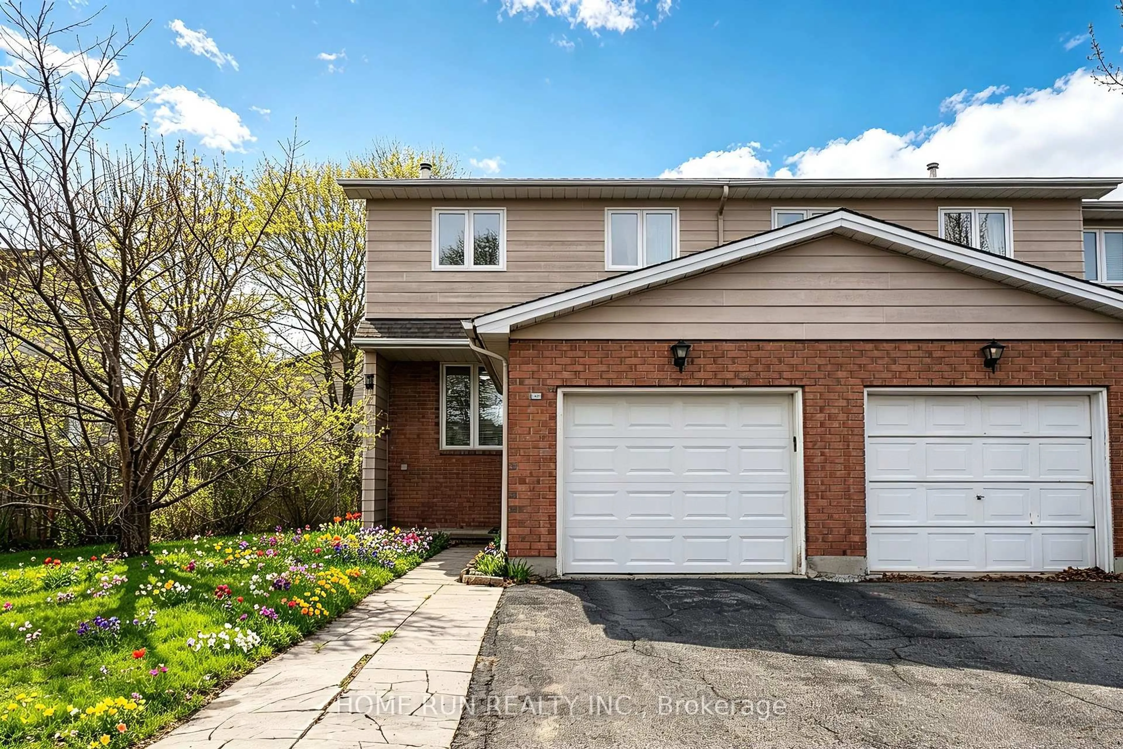 Home with brick exterior material, street for 30 Sturbridge Private, Ottawa Ontario K1T 3J7