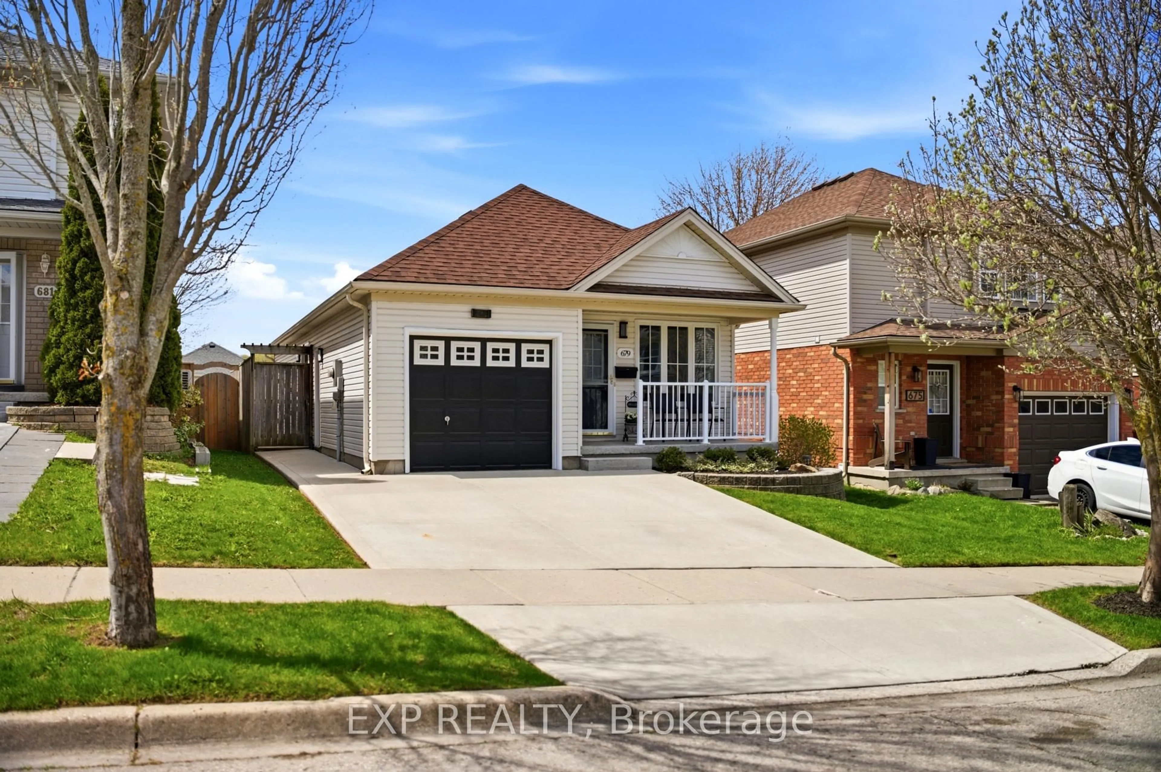 Home with brick exterior material, street for 679 Zermatt Dr, Waterloo Ontario N2T 2V2