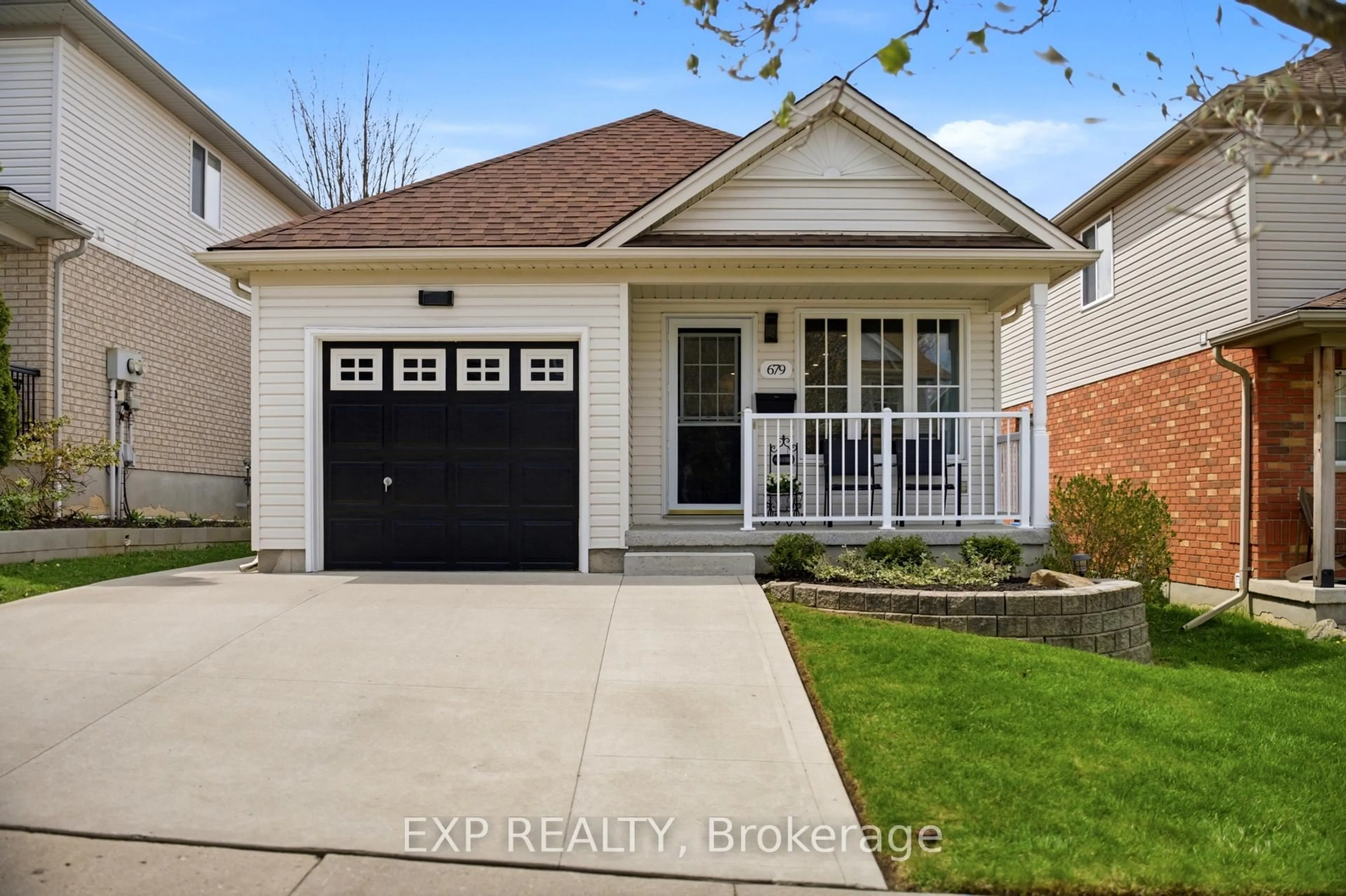 Home with brick exterior material, street for 679 Zermatt Dr, Waterloo Ontario N2T 2V2