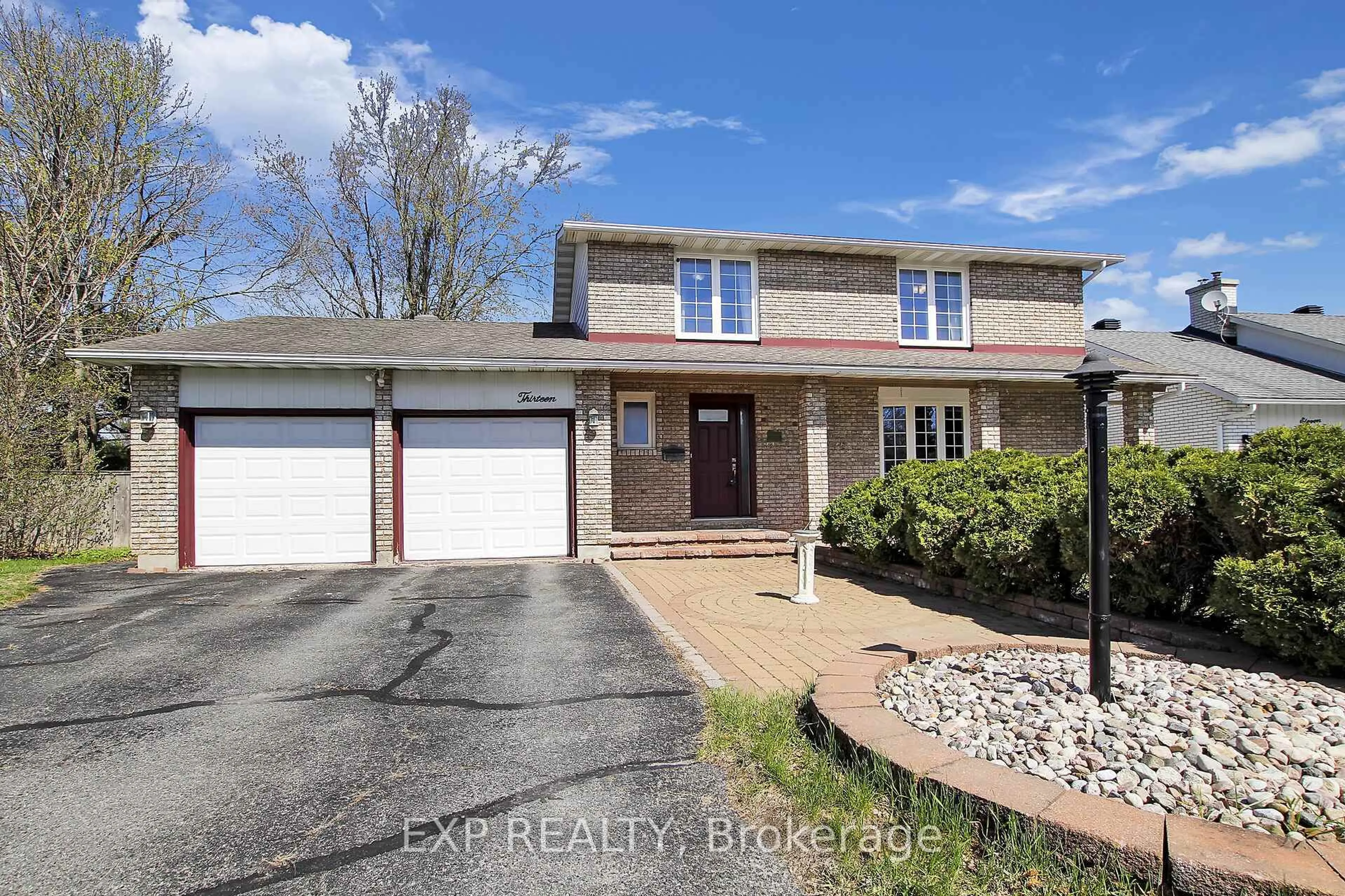 Home with brick exterior material, street for 13 Shanel Pl, Barrhaven Ontario K2J 1C3