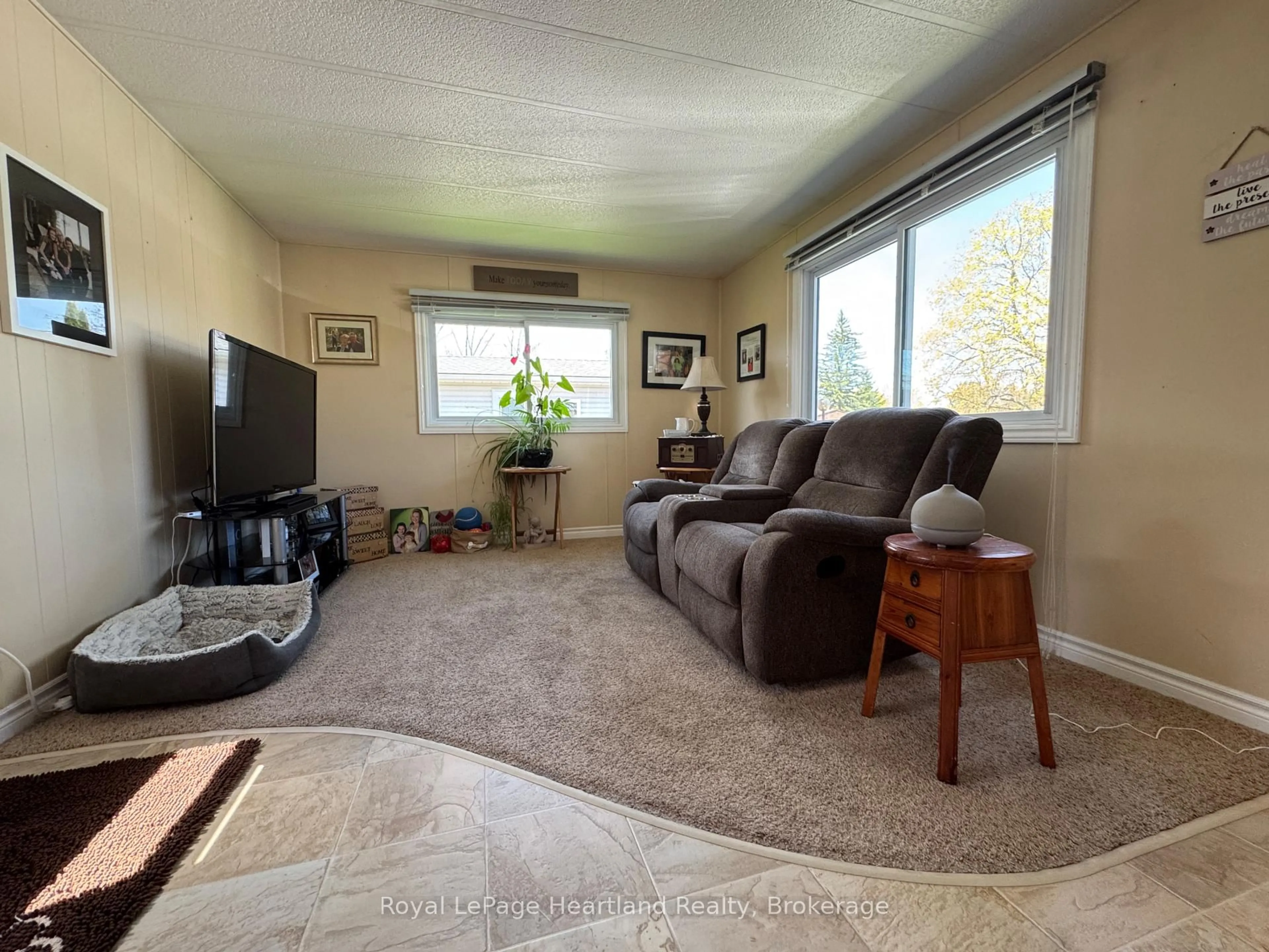 Living room with furniture, unknown for 39724 Amberley Rd #36, Morris Turnberry Ontario N0G 2W0