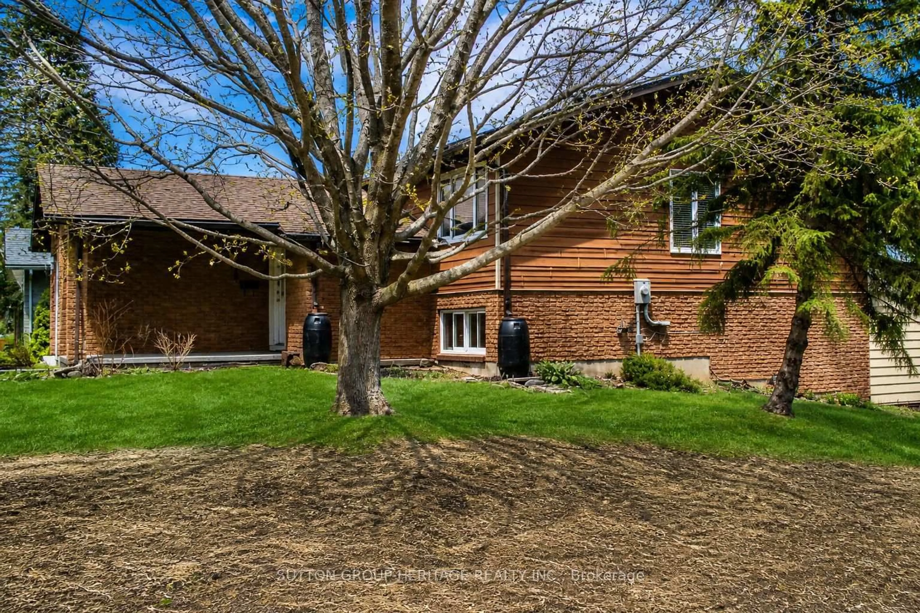 Home with brick exterior material, street for 48 CEDARTREE Lane, Kawartha Lakes Ontario K0M 1A0