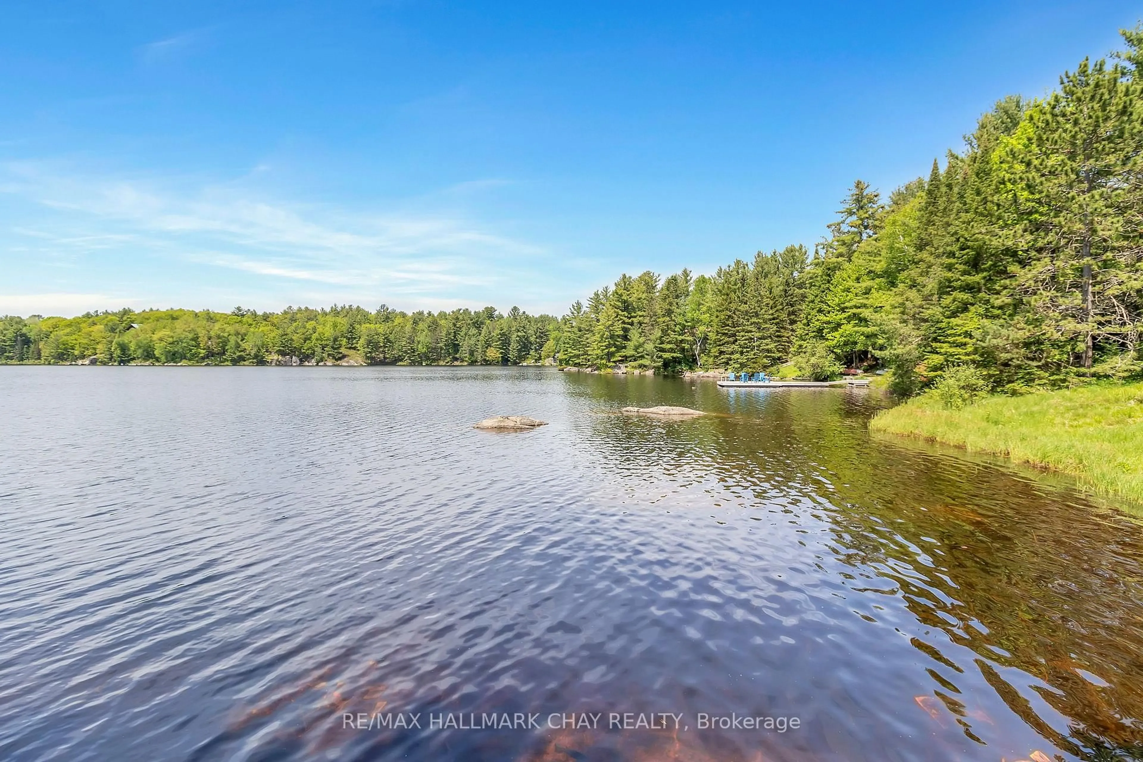 A pic from outside/outdoor area/front of a property/back of a property/a pic from drone, water/lake/river/ocean view for 1070 Chaikof Rd, Bracebridge Ontario P1P 1R3
